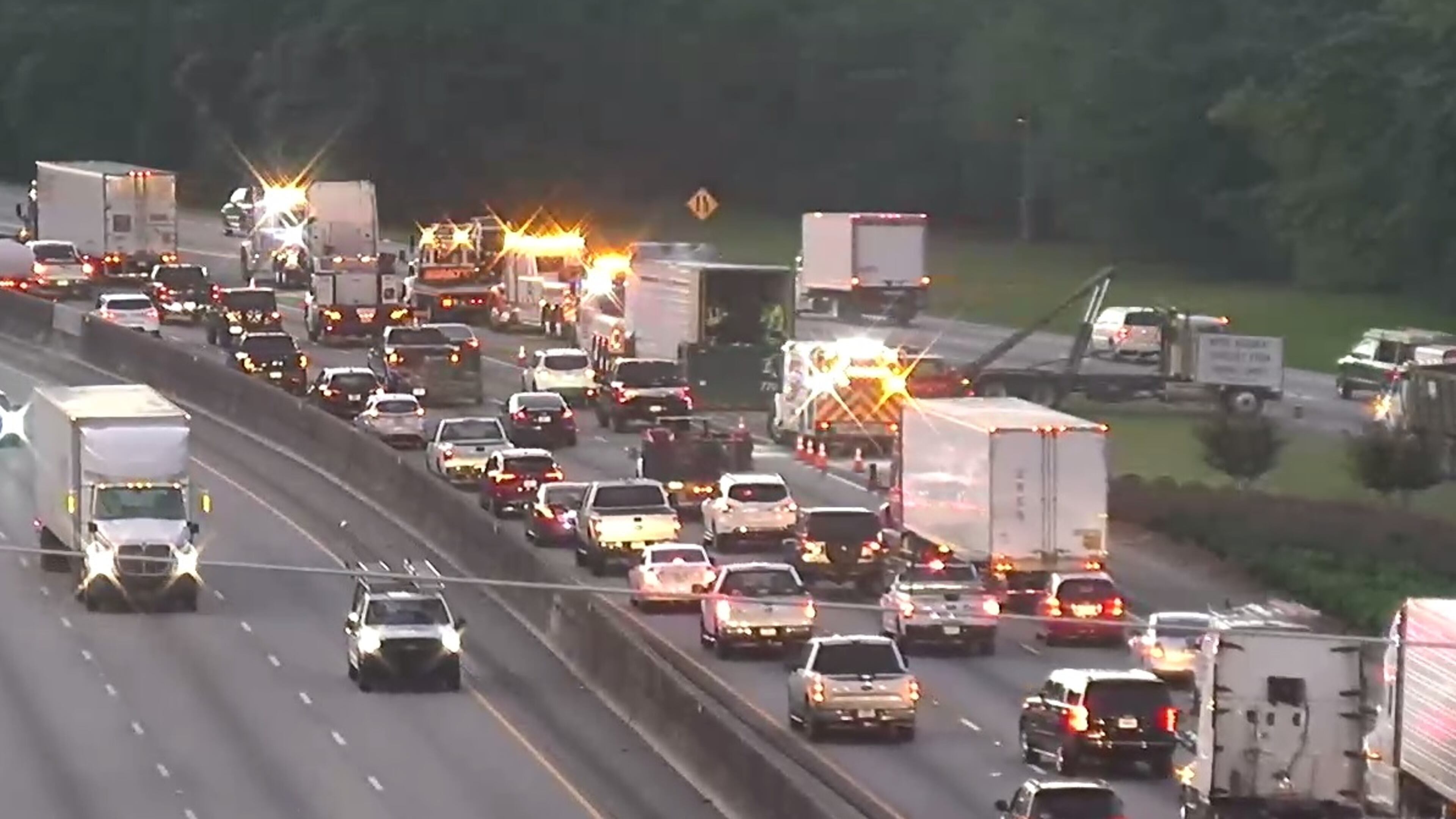 The driver died after his vehicle was hit by a tractor-trailer.