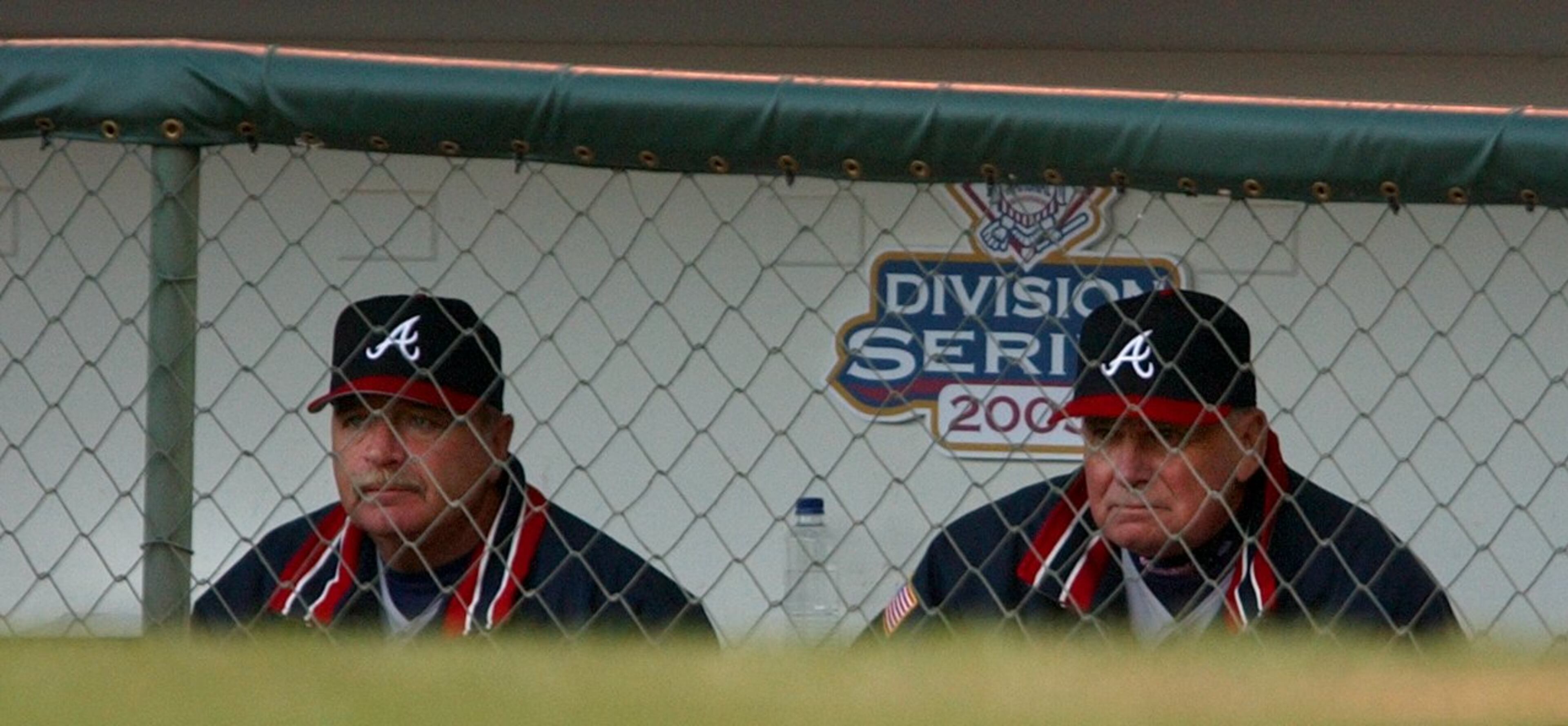 Braves manager Bobby Cox (right) and pitching coach Leo Mazzone watch the action at Wrigley Field on October 4, 2003 in the National League Division Series.