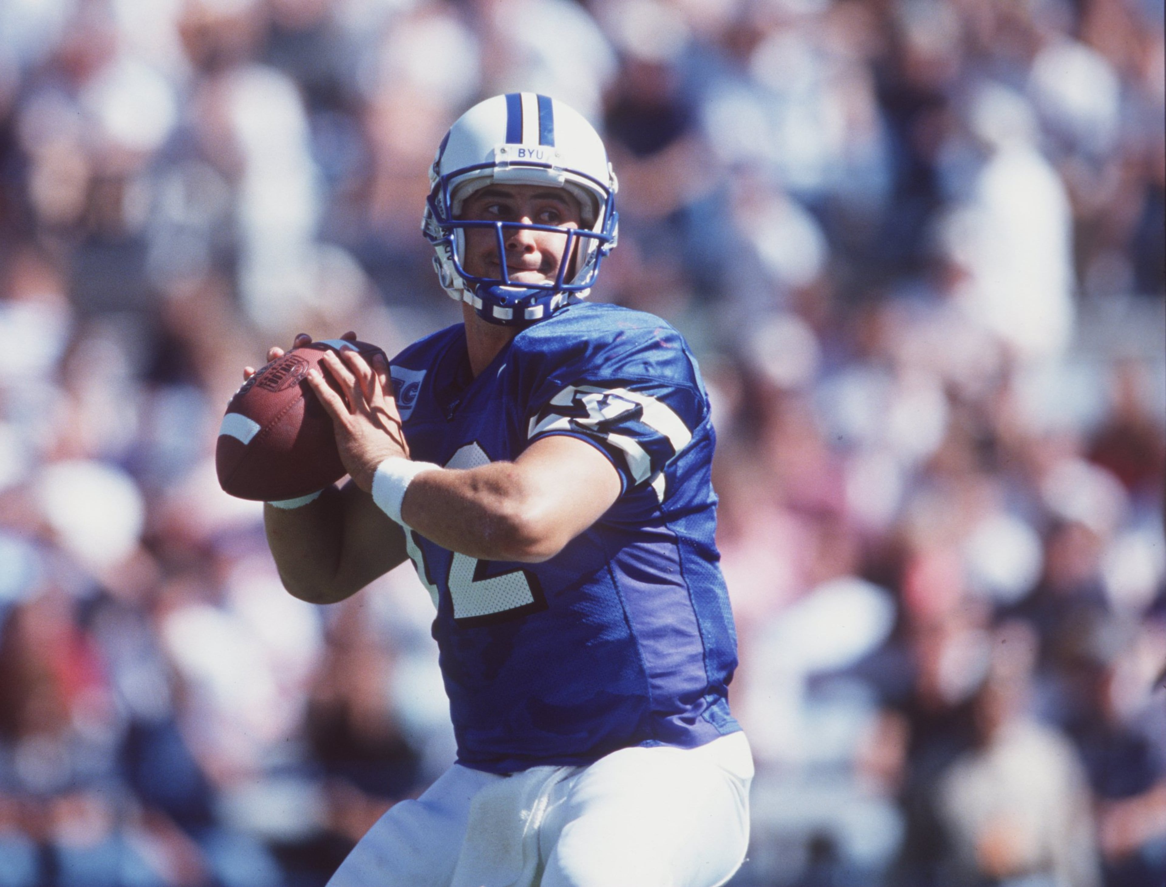 28 Sep 1996: Steve Sarkisian of Brigham Young University prepares to throw a pass during their 31-3 victory over Southern Methodist University at Cougar stadium in Provo, Utah. Mandatory Credit: Stephen Dunn/Allsport