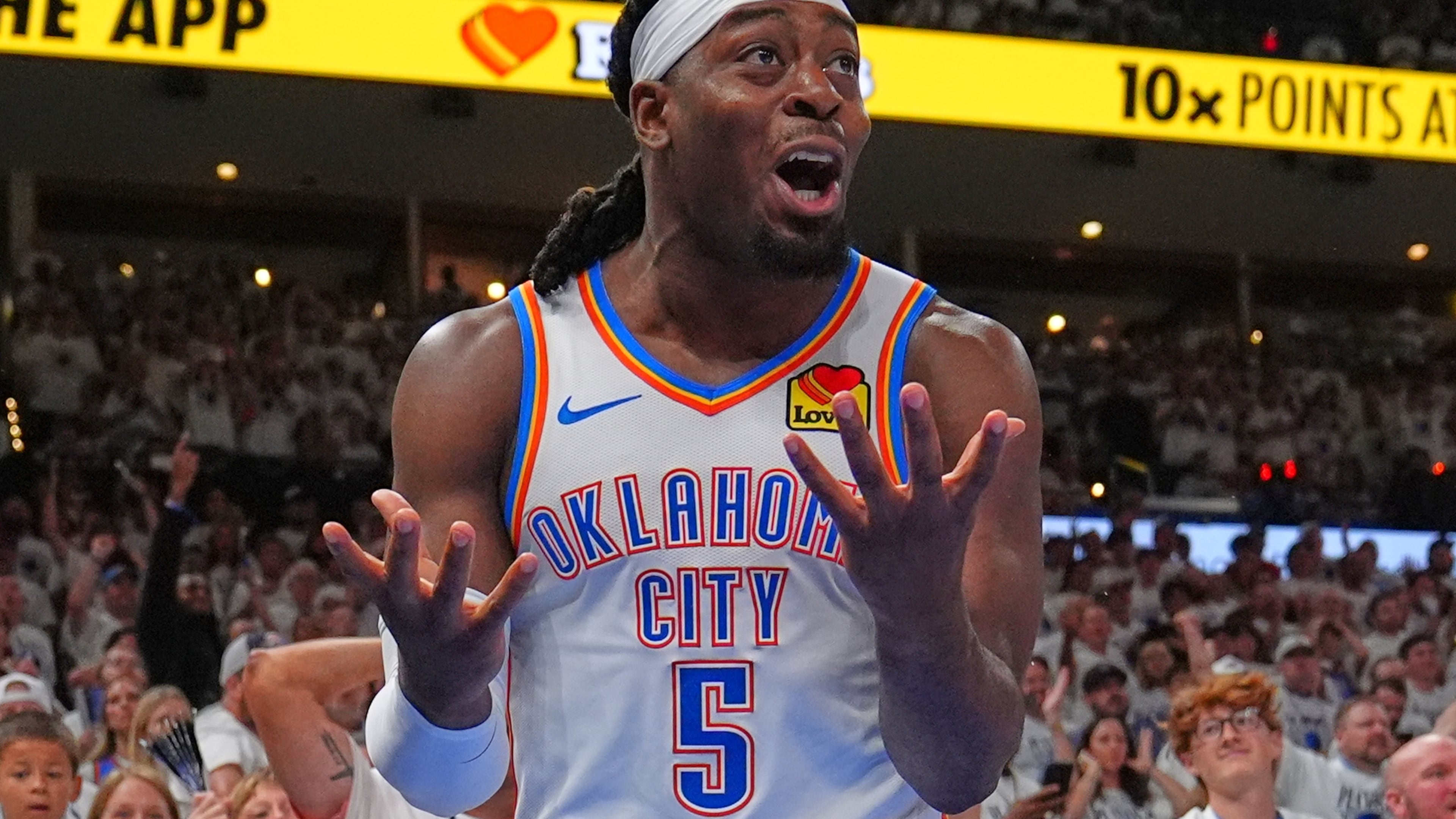 FILE - Oklahoma City Thunder guard Luguentz Dort (5) reacts to a foul in the second half of Game 5 in the Western Conference finals NBA basketball playoffs series against the San Antonio Spurs, May 26, 2026, in Oklahoma City. (AP Photo/Julio Cortez, File)