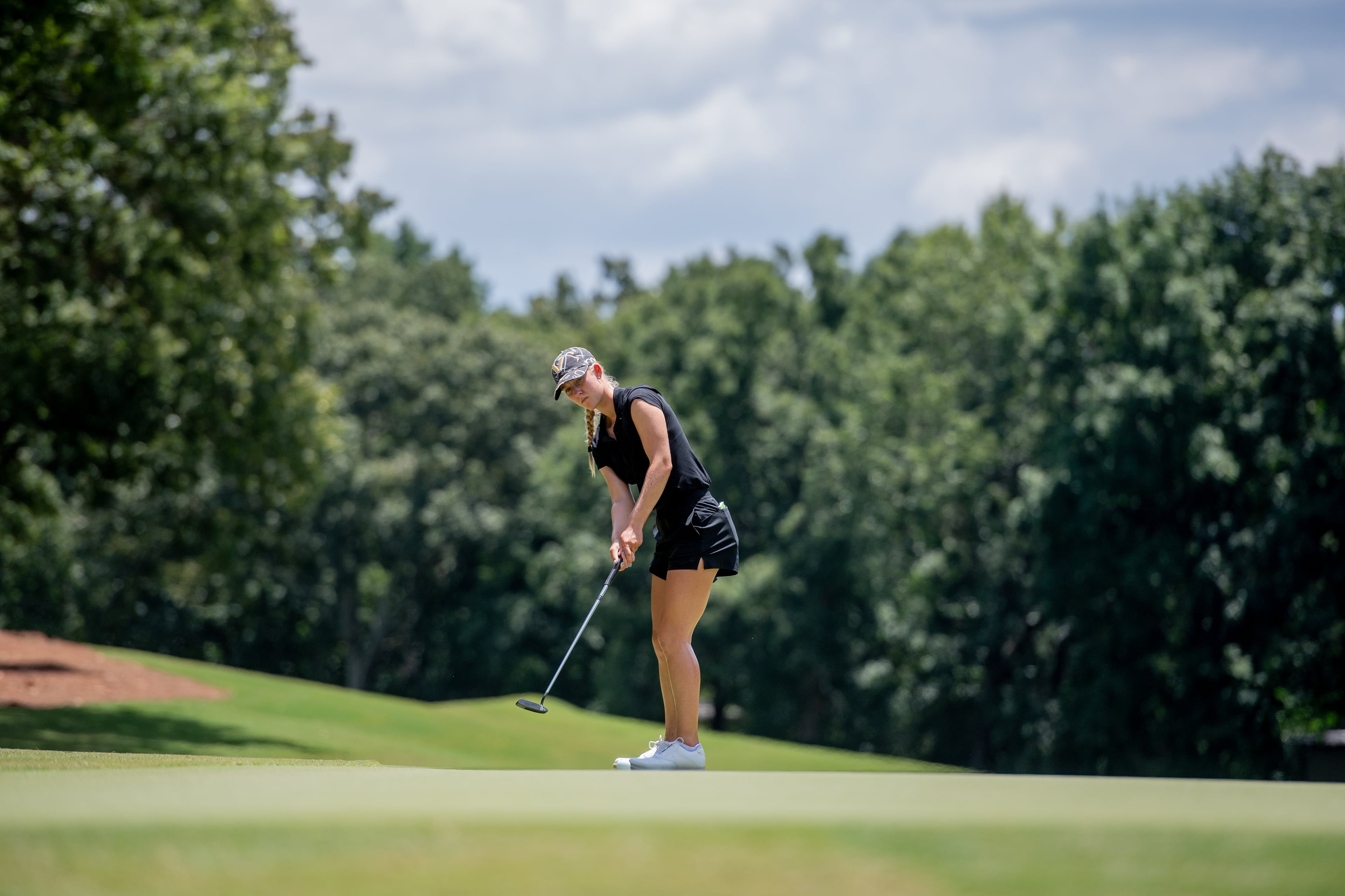 Ava Merrill of Johns Creek rolls a putt during the 2025 Georgia Women's Amateur, which she won. (Kate Awtrey-King for the AJC)
