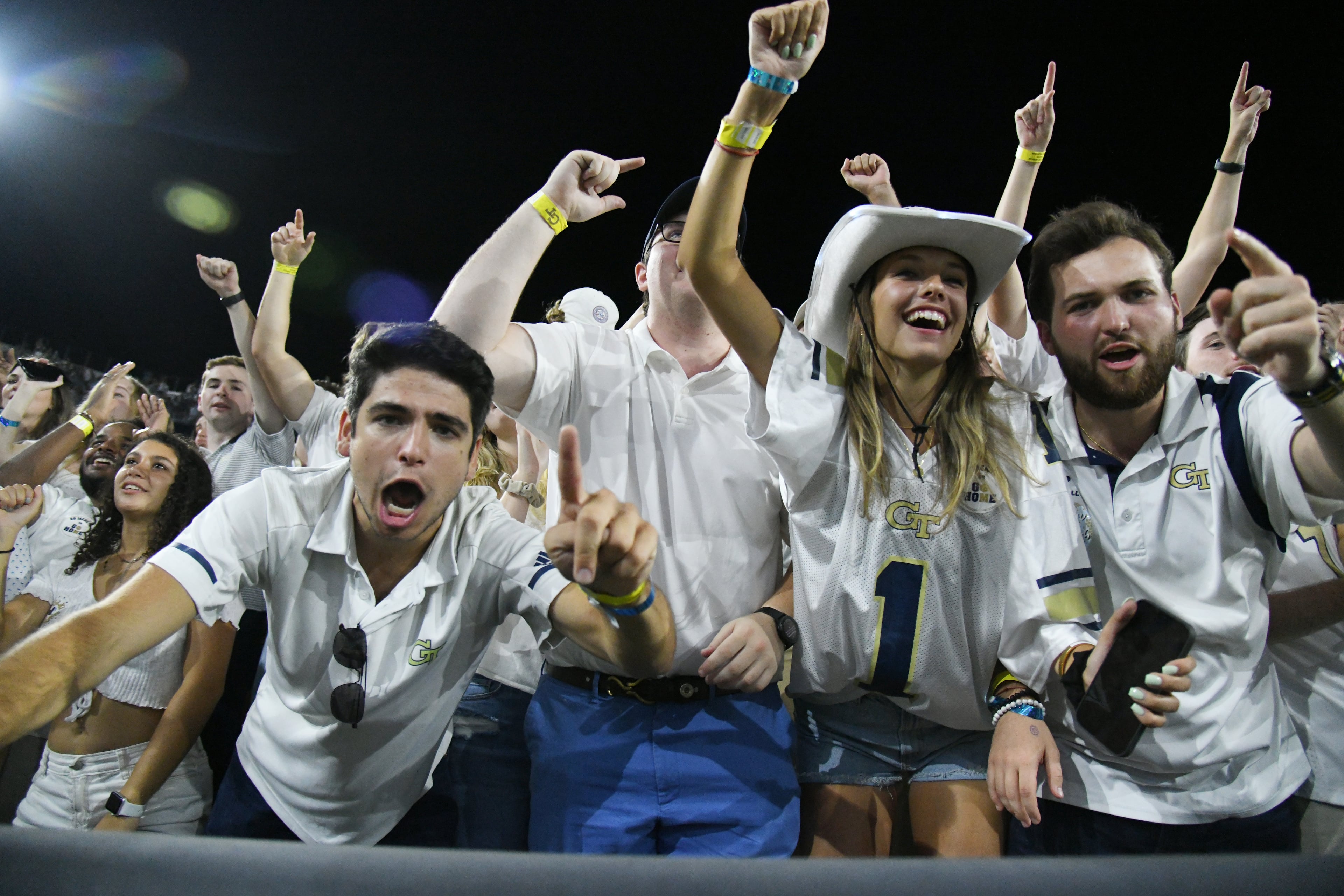 September 4, 2021 Atlanta - Georgia Tech fans cheer after wide receiver Kyric McGowan (2) scored a touchdown during the first half of an NCAA college football game at Georgia Tech's Bobby Dodd Stadium in Atlanta on Saturday, September 4, 2021. (Hyosub Shin / Hyosub.Shin@ajc.com)