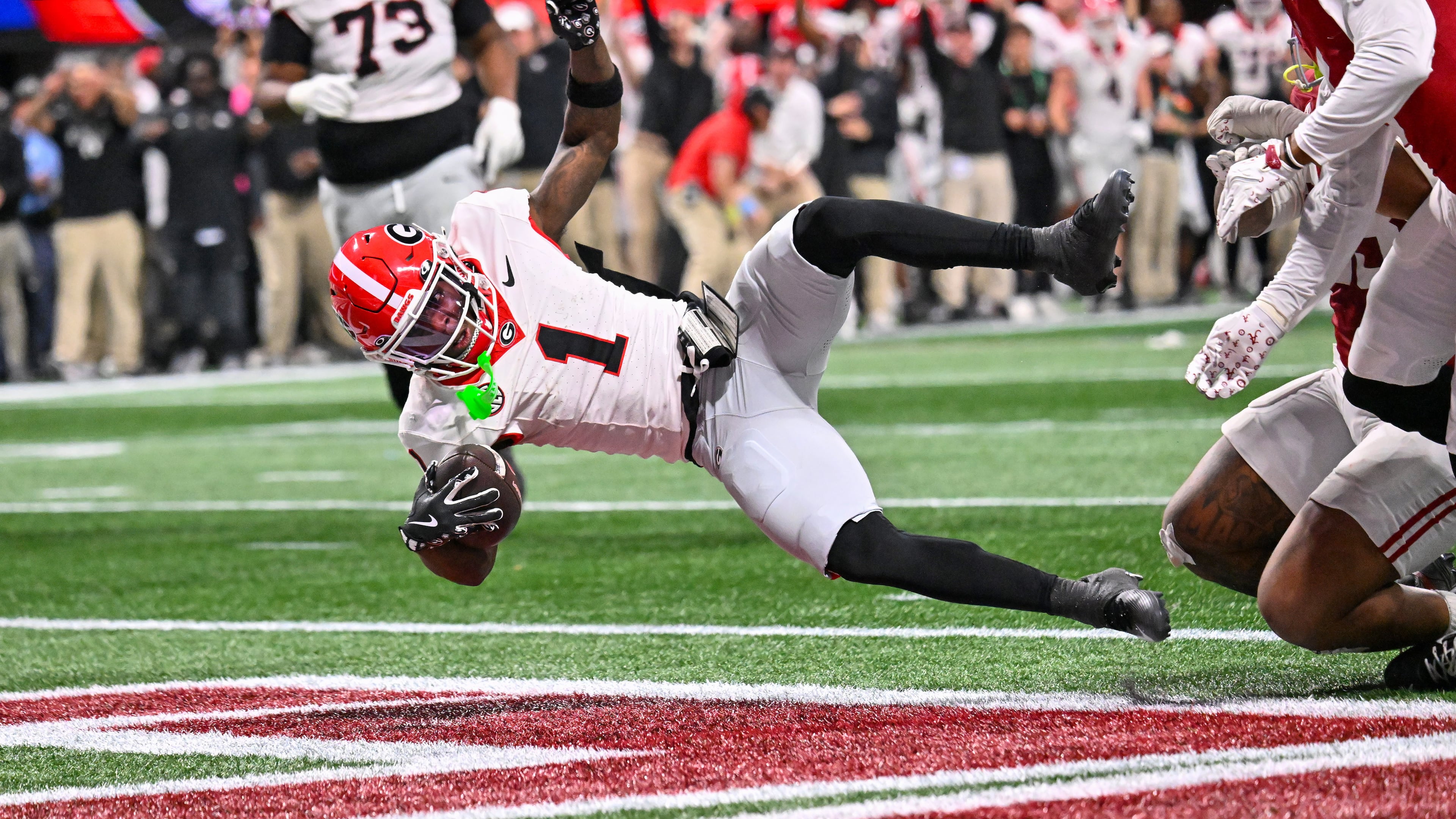 Georgia wide receiver Zachariah Branch — pictured scoring against Alabama in the SEC championship game in December — was arrested early Sunday morning in Athens on misdemeanor charges. (Hyosub Shin/AJC 2025)