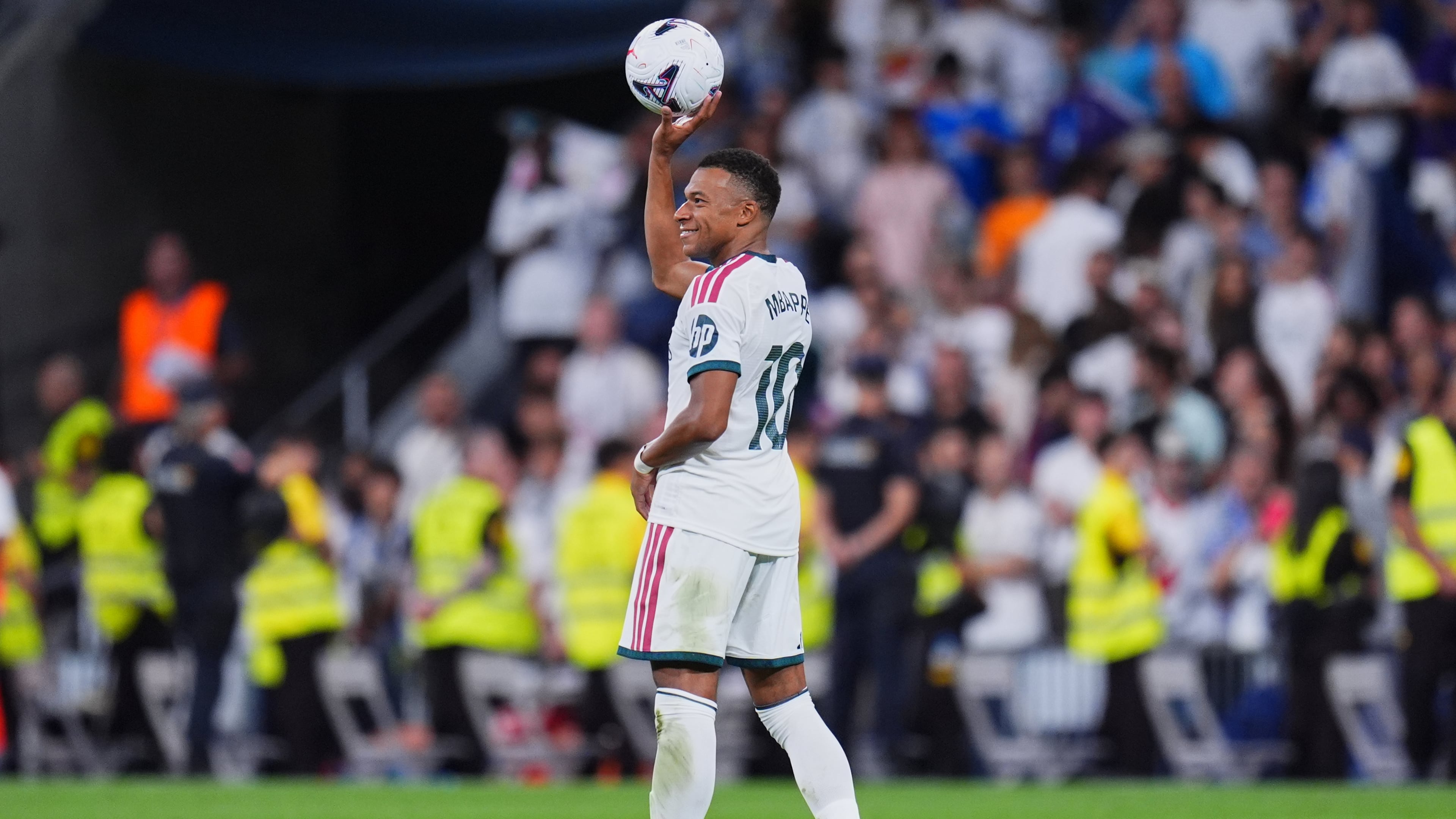 Real Madrid's Kylian Mbappe celebrates after scoring during the La Liga soccer match between Real Madrid and Real Sociedad in Madrid, Spain, Wednesday, Aug. 26, 2026. (AP Photo/Manu Fernandez)