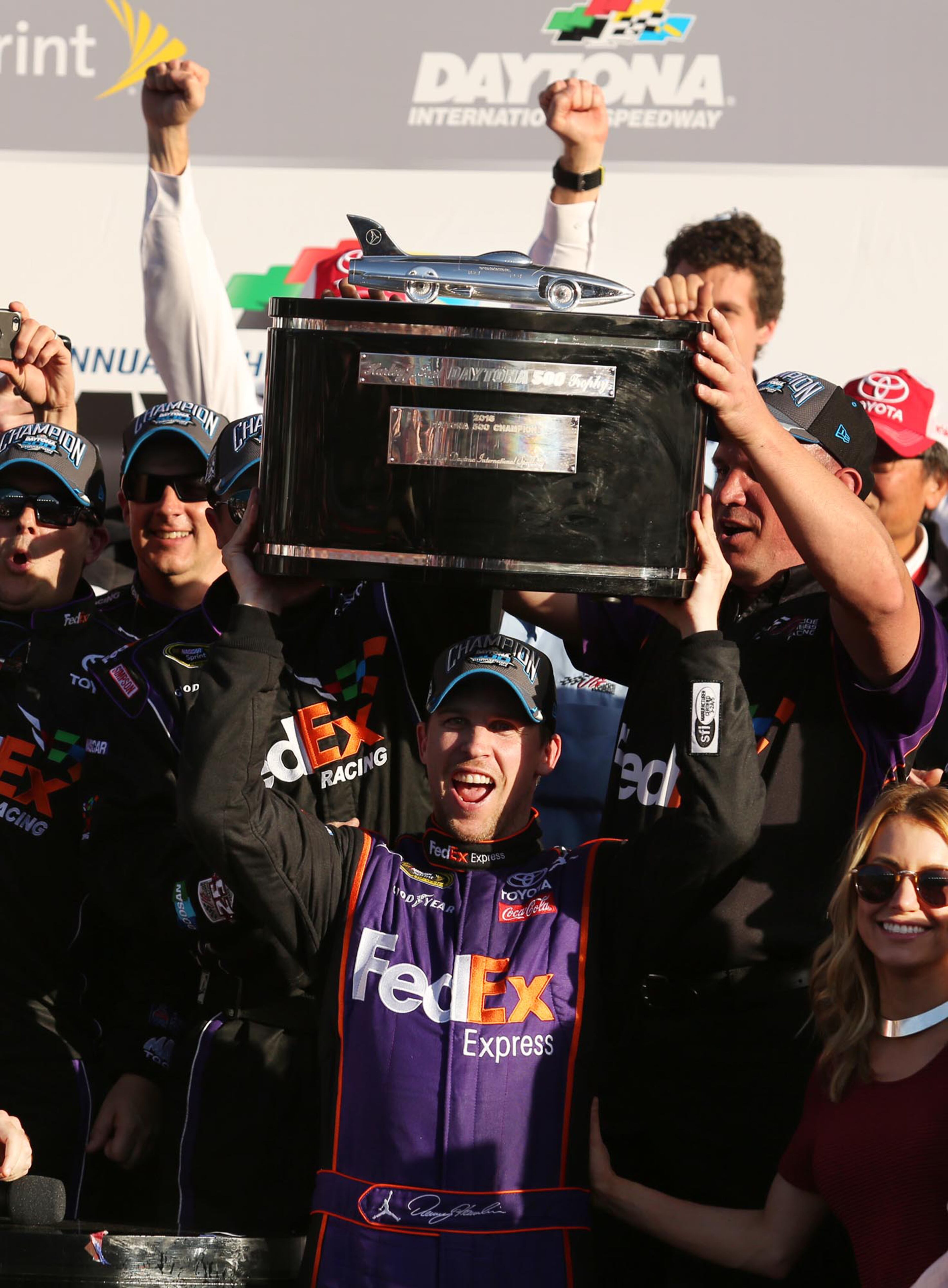 Denny Hamlin celebrates in Victory Lane after winning the Daytona 500 NASCAR Sprint Cup race at Daytona International Speedway in Daytona Beach, Fla., on Sunday, Feb. 21, 2016. (Stephen M. Dowell/Orlando Sentinel/TNS)