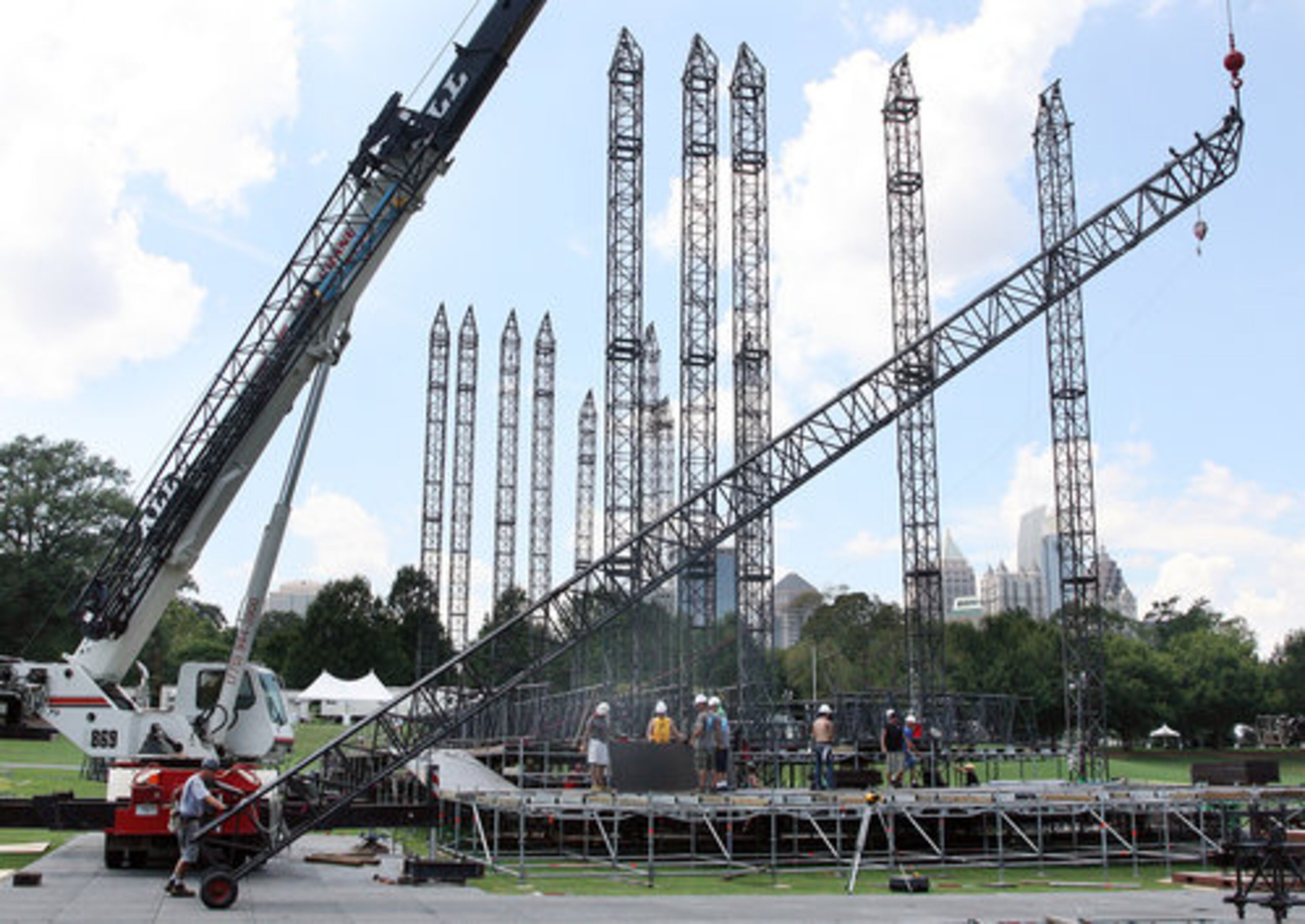 The crew master said it would take twelve supervisors and 35 local hands three days to construct the roughly 75 foot deep, 165 foot wide & 75 foot tall stage.