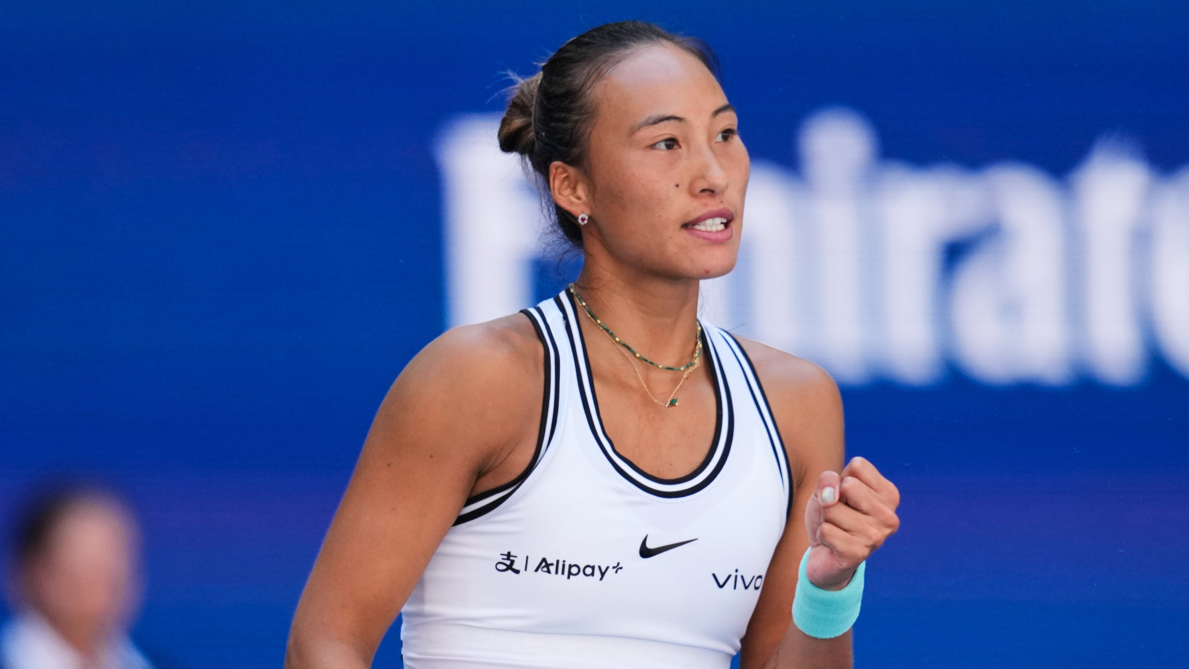 Qinwen Zheng, of China, reacts during a match against Iga Swiatek, of Poland, during the fourth round of the U.S. Open tennis championships, Monday, Sept. 7, 2026, in New York. (AP Photo/Seth Wenig)