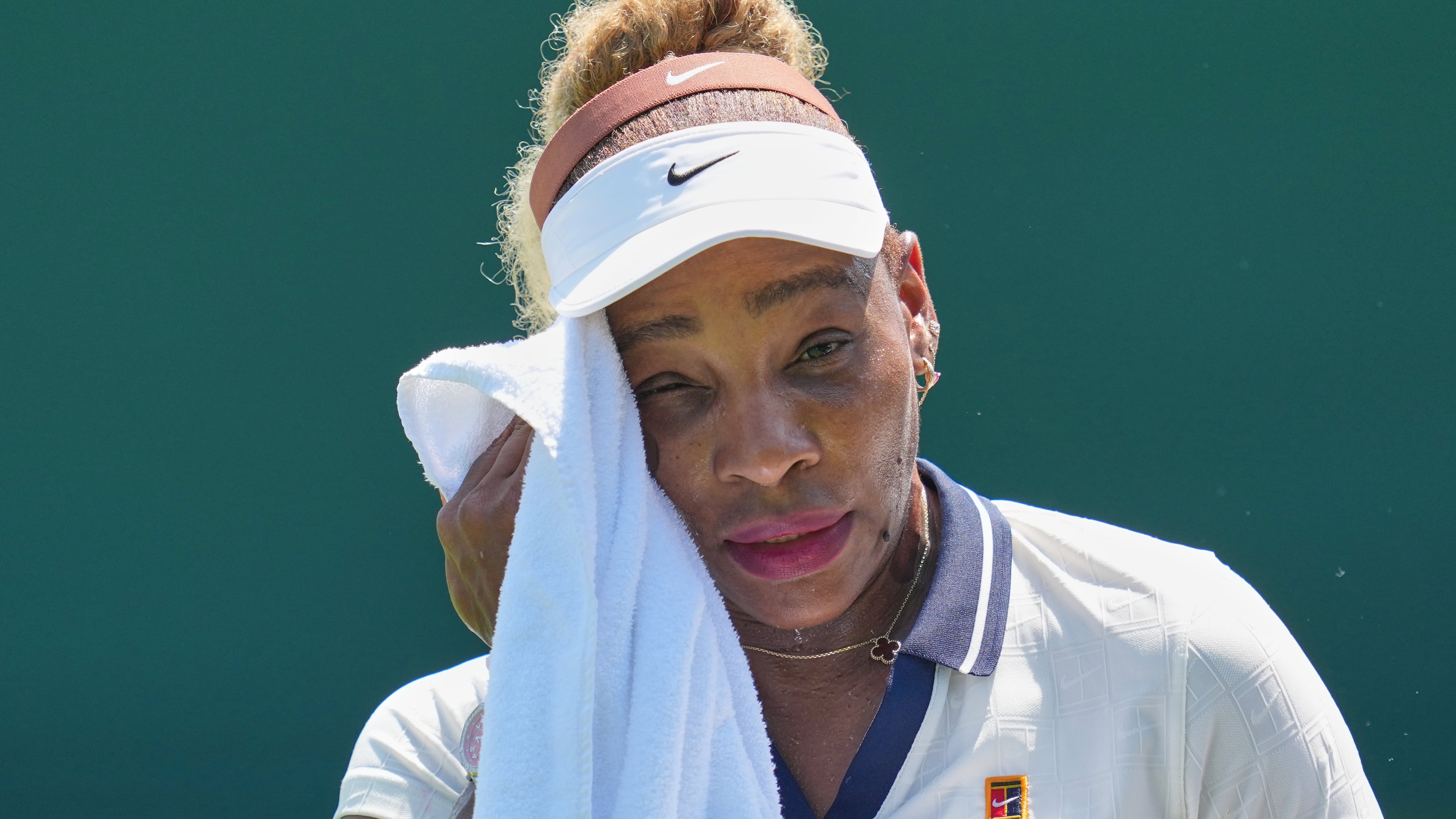 Serena Williams of the United States wipes sweat during a practice session ahead of the Wimbledon Tennis Championships, in London, Wednesday, June 24, 2026. (AP Photo/Kin Cheung)