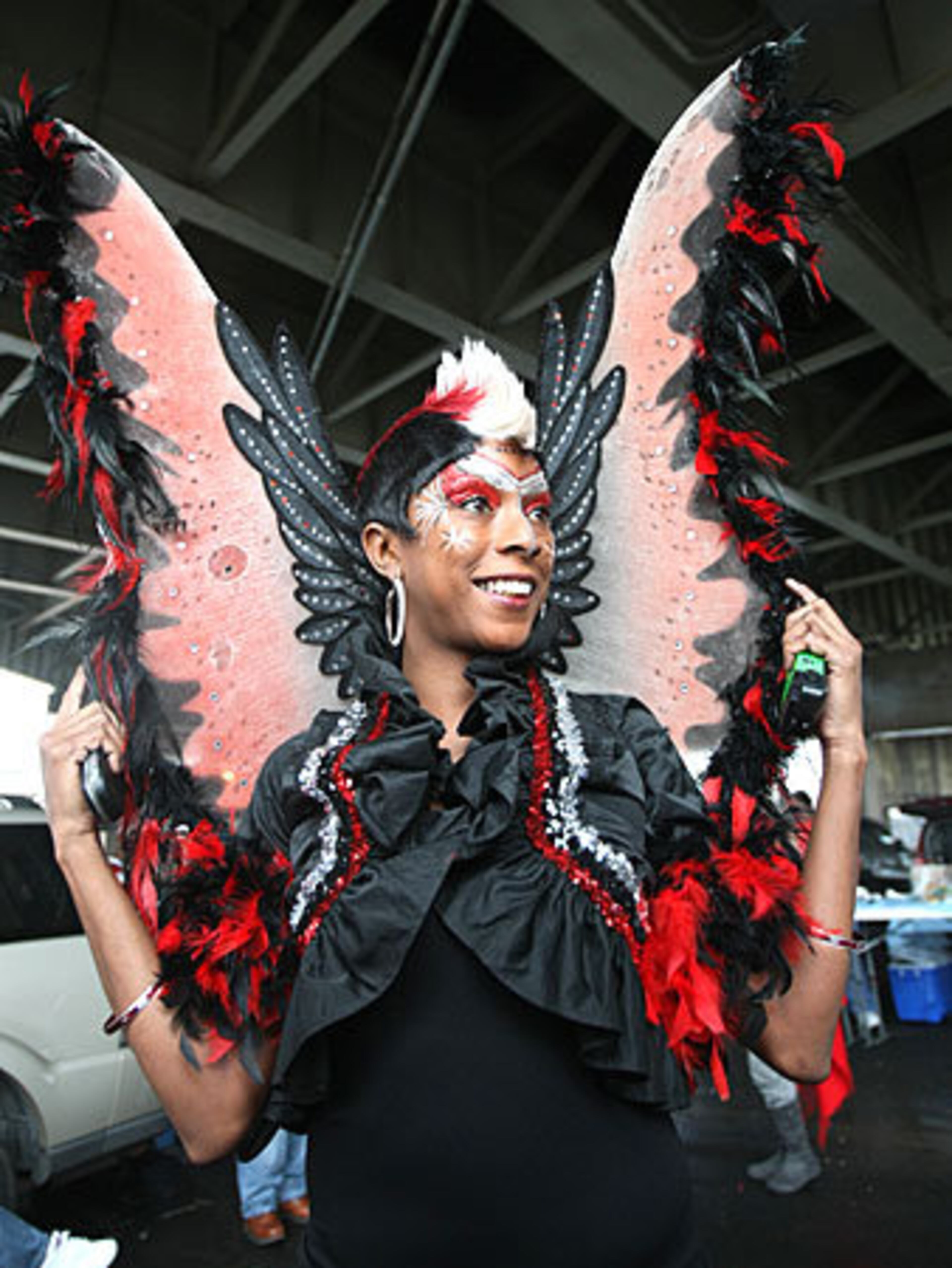 The Falcons "Bird Lady" Keisha Burns, 39, Decatur, arrives in fashion for Sunday's game.