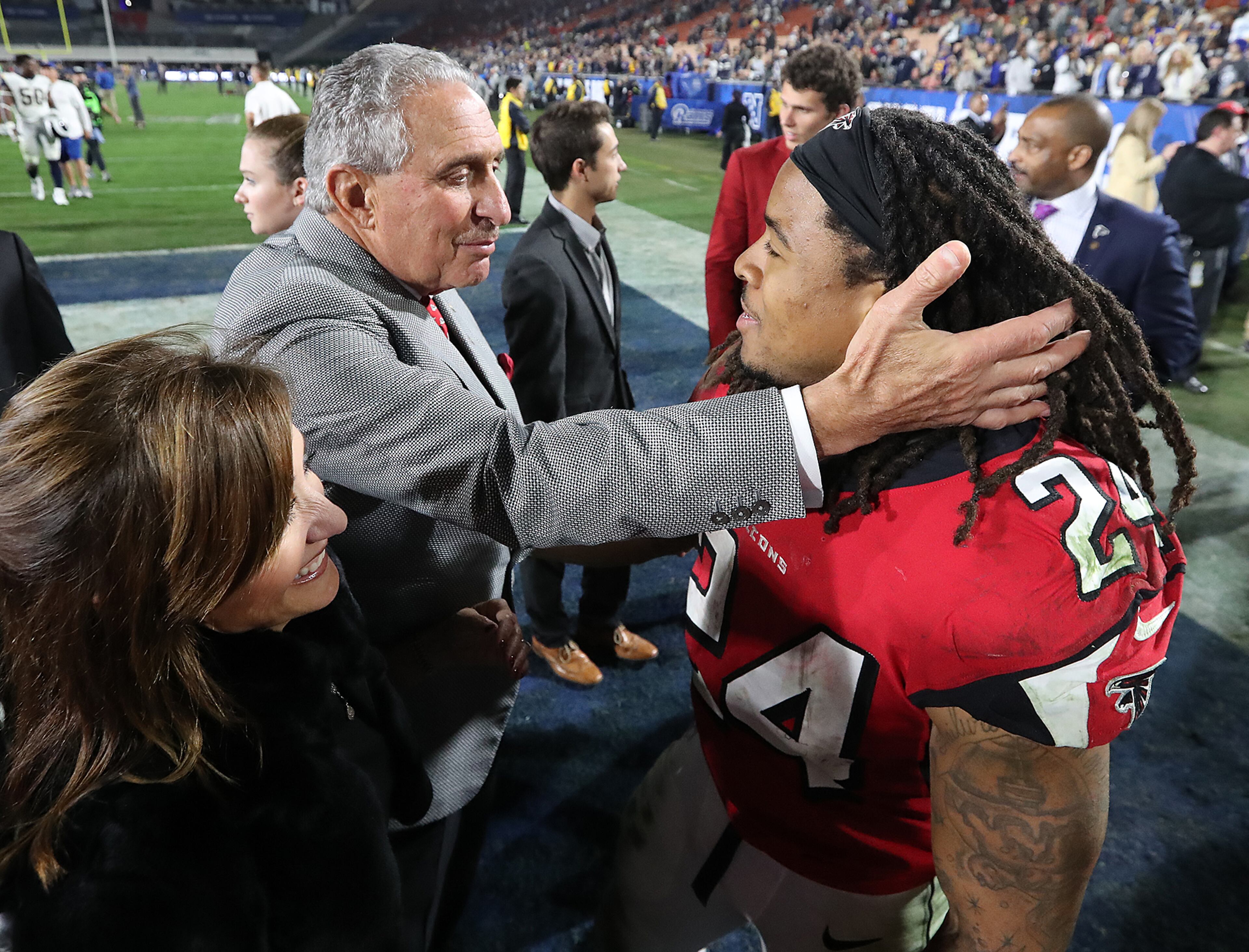 January 6, 2018 Los Angeles: Falcons owner Arthur Blank and running back Devonta Freeman celebrate a 26-13 victory over the Rams in their NFL Wild Card Game on Saturday, January 6, 2018, in Los Angeles. Curtis Compton/ccompton@ajc.com