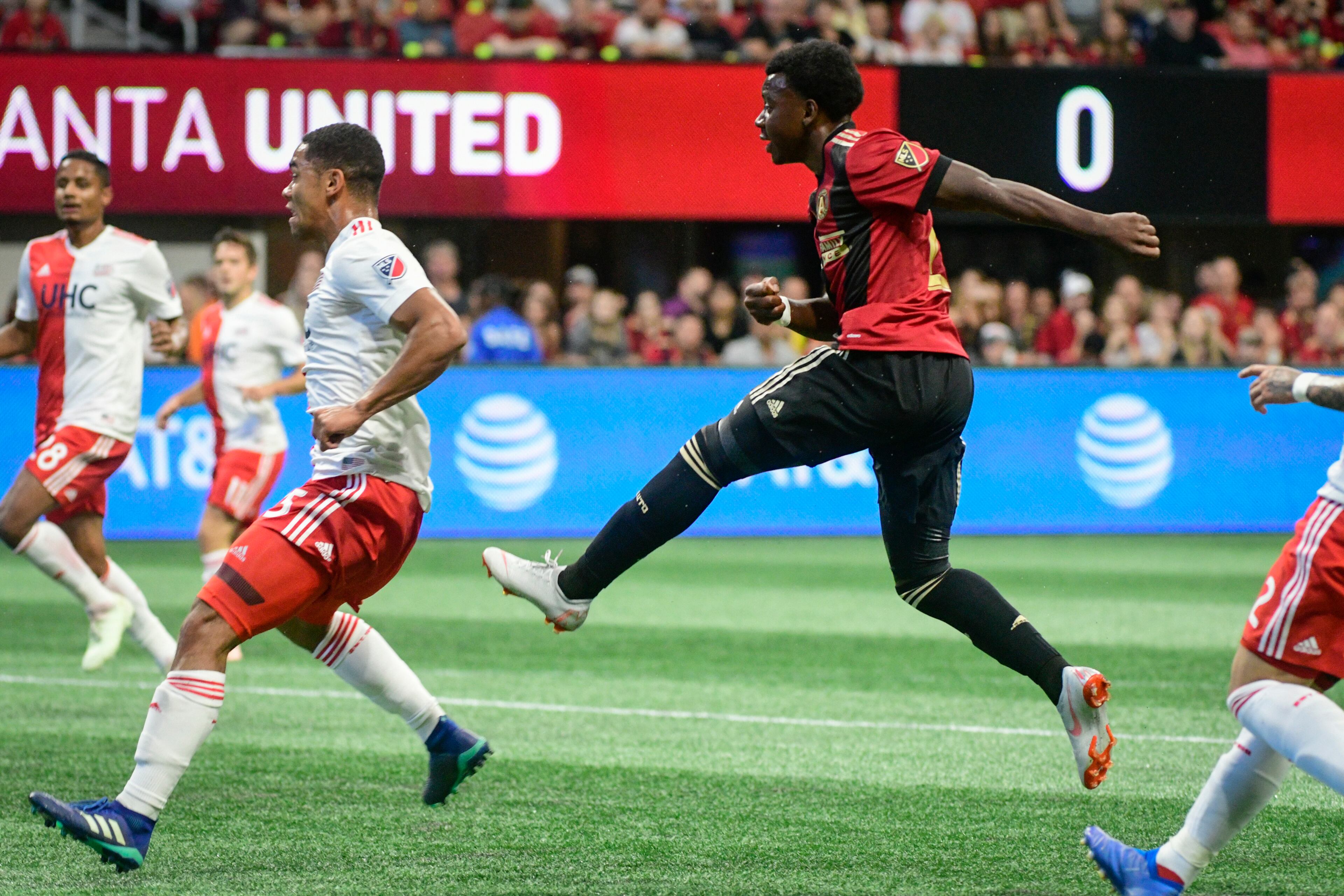 Atlanta United's George Bello follows through on a goal scoring kick against the New England Revolution during the first half of an MLS soccer game, Saturday, Oct. 6, 2018. (John Amis)