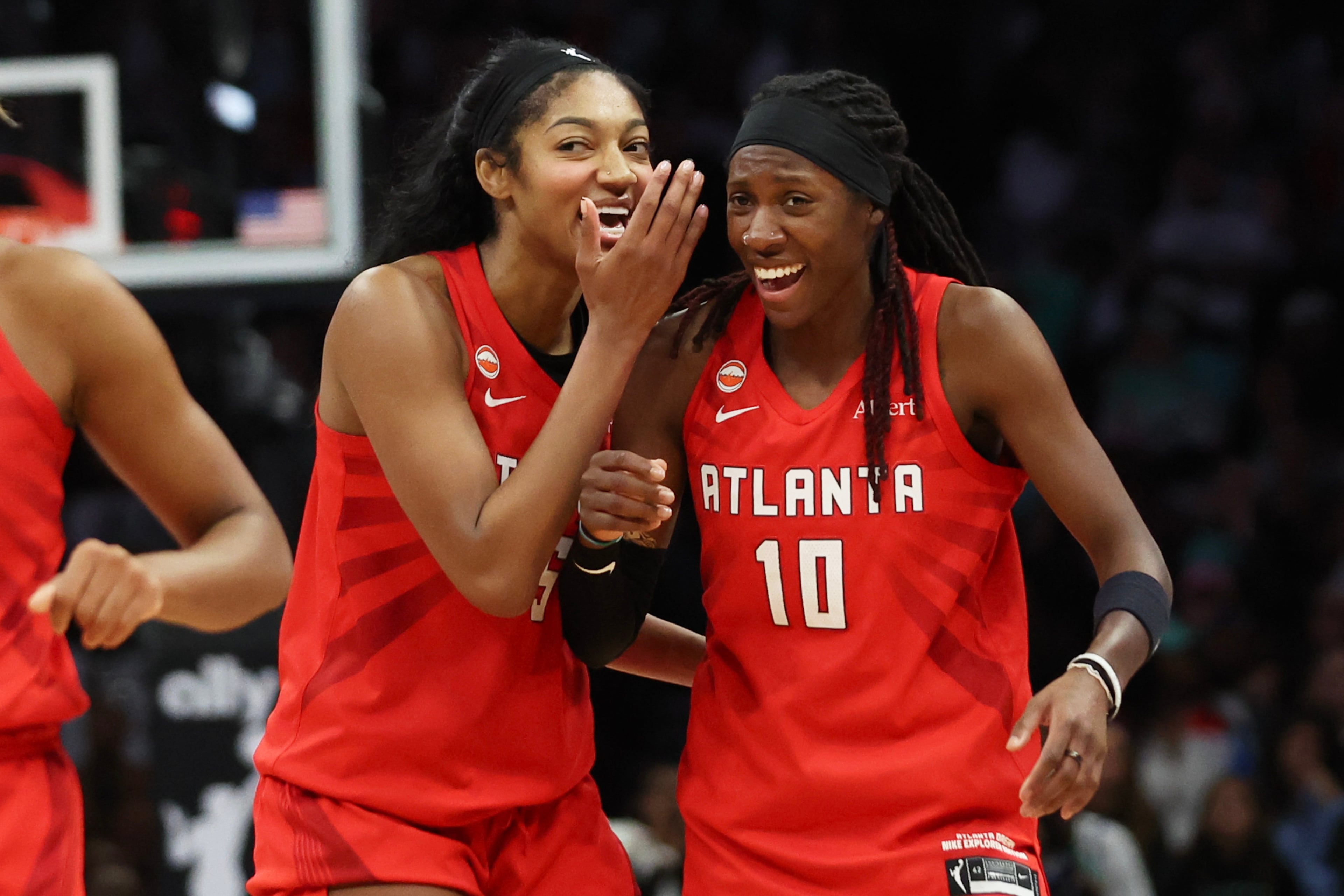 The Dream's Angel Reese (left) and Rhyne Howard, totally laughing at that infomercial bit. (Heather Khalifa/AP)