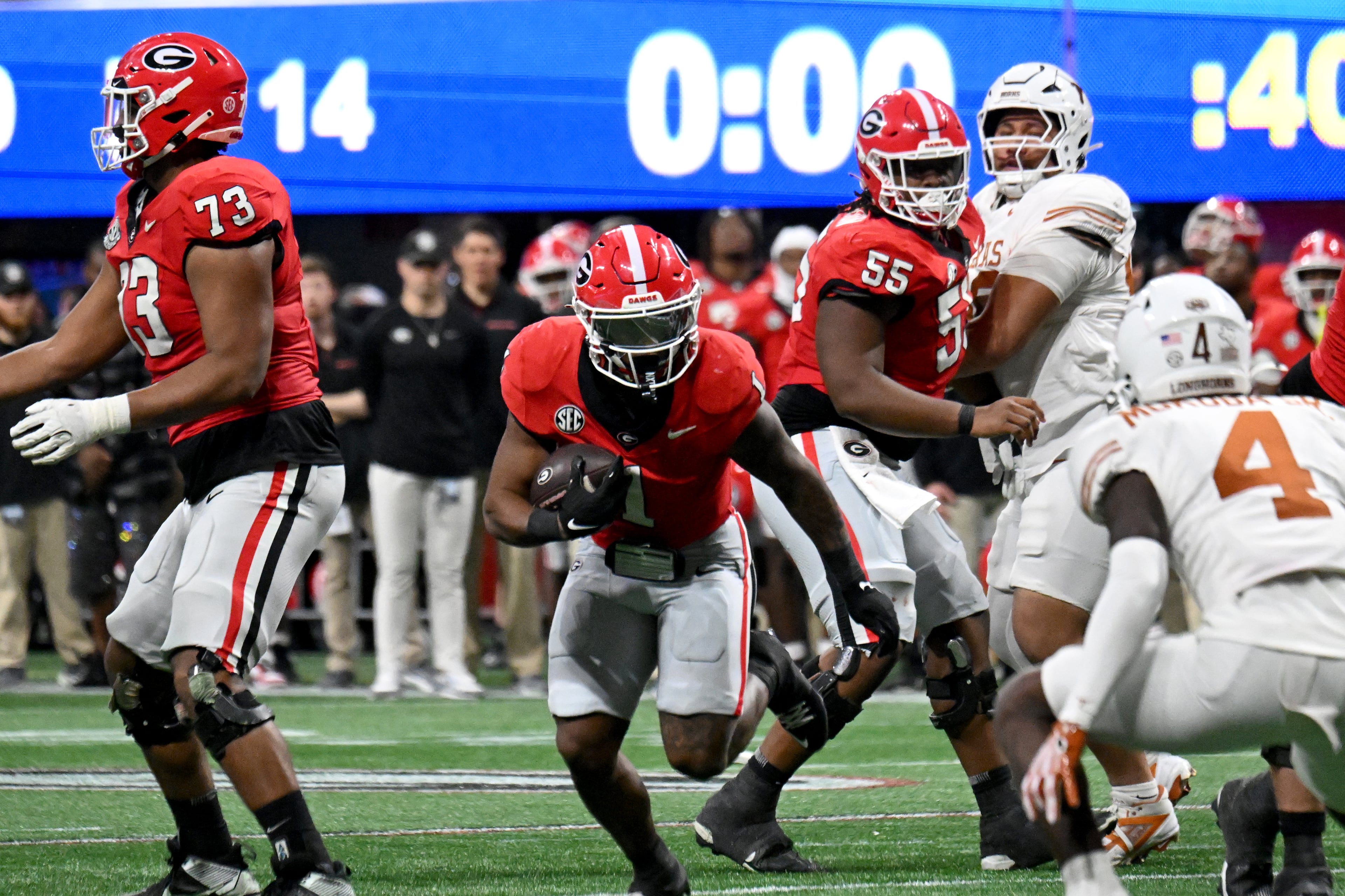 Georgia running back Trevor Etienne (1) runs the ball in overtime during the SEC Championship football game at the Mercedes-Benz Stadium, Saturday, December 7, 2024, in Atlanta. Georgia won 22-19 over Texas in overtime. (Hyosub Shin / AJC)