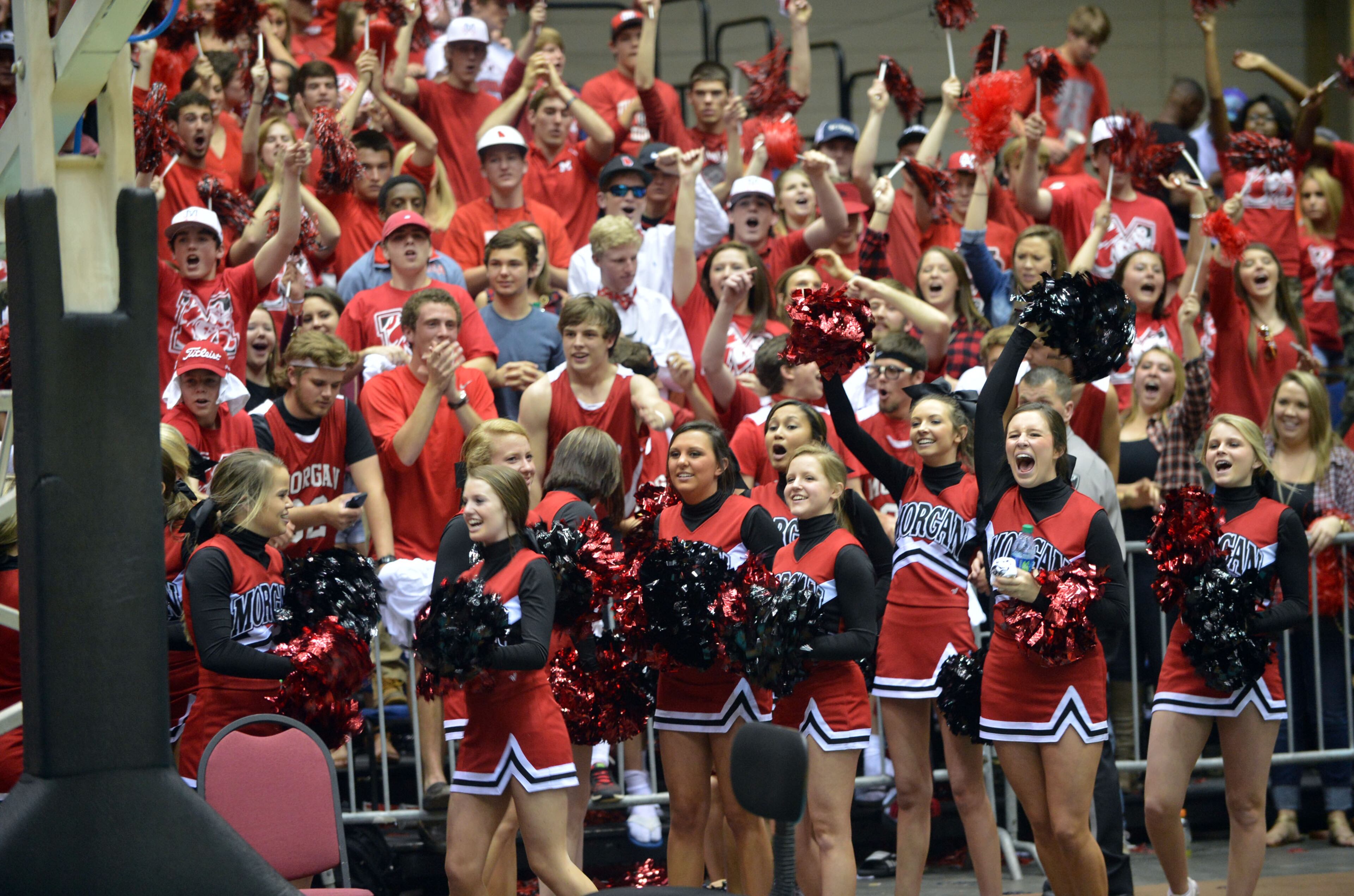 Morgan County Bulldogs fans and cheerleaders celebrate after the game. Coverage of the Class AAA boys basketball championship between the Buford Wolves and Morgan County Bulldogs at the Macon Coliseum Saturday, March 8, 2014. Morgan County won handily, beating the Buford Wolves 69-45.