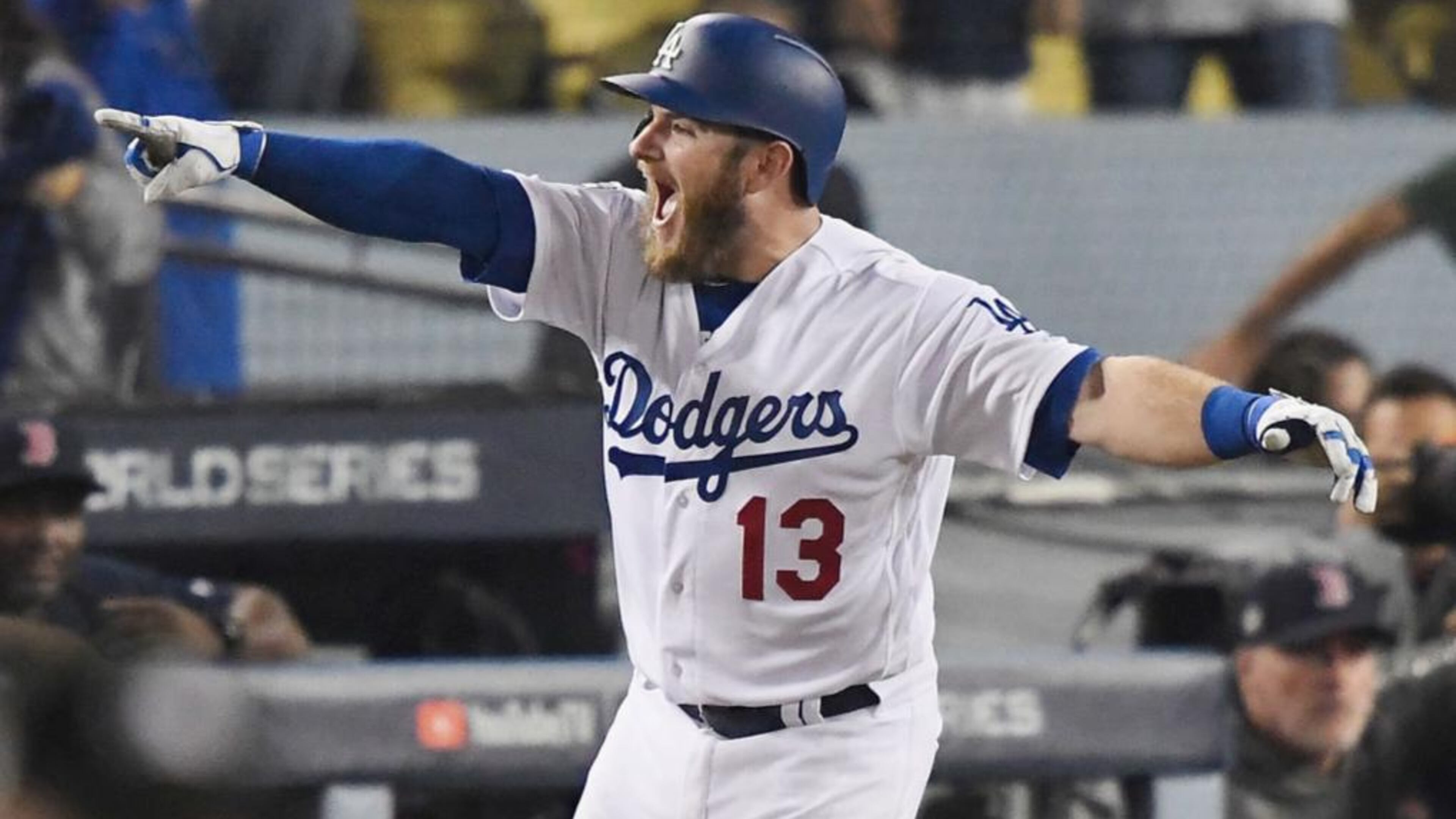 Max Muncy celebrates after his 18th-inning solo homer gave the Dodgers a 3-2 win in Game 3 of the World Series.