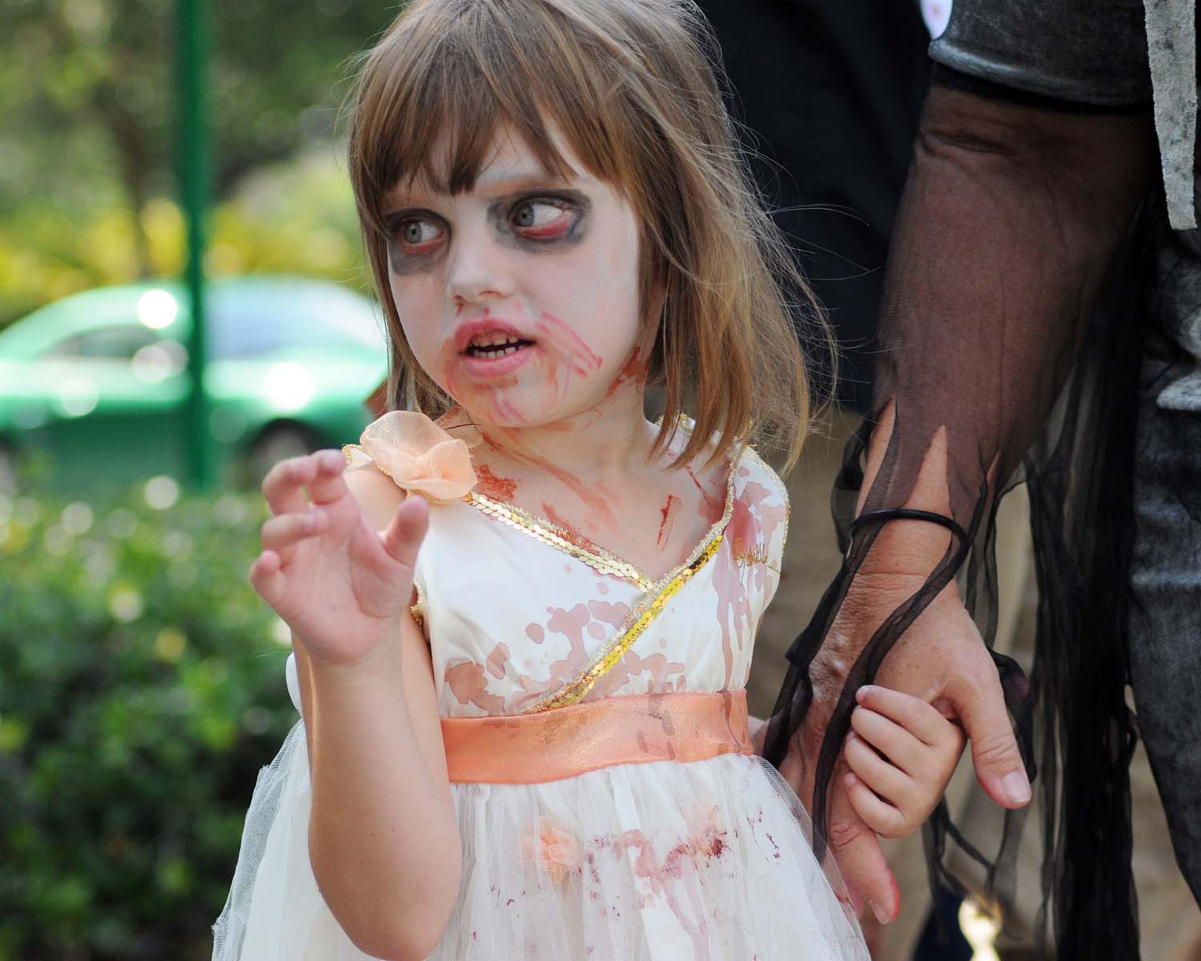 A pack of blood-thirsty zombies marched on the Rosen Centre Hotel in Orlando, Florida to kick off Spooky Empire's annual May-Hem horror convention.