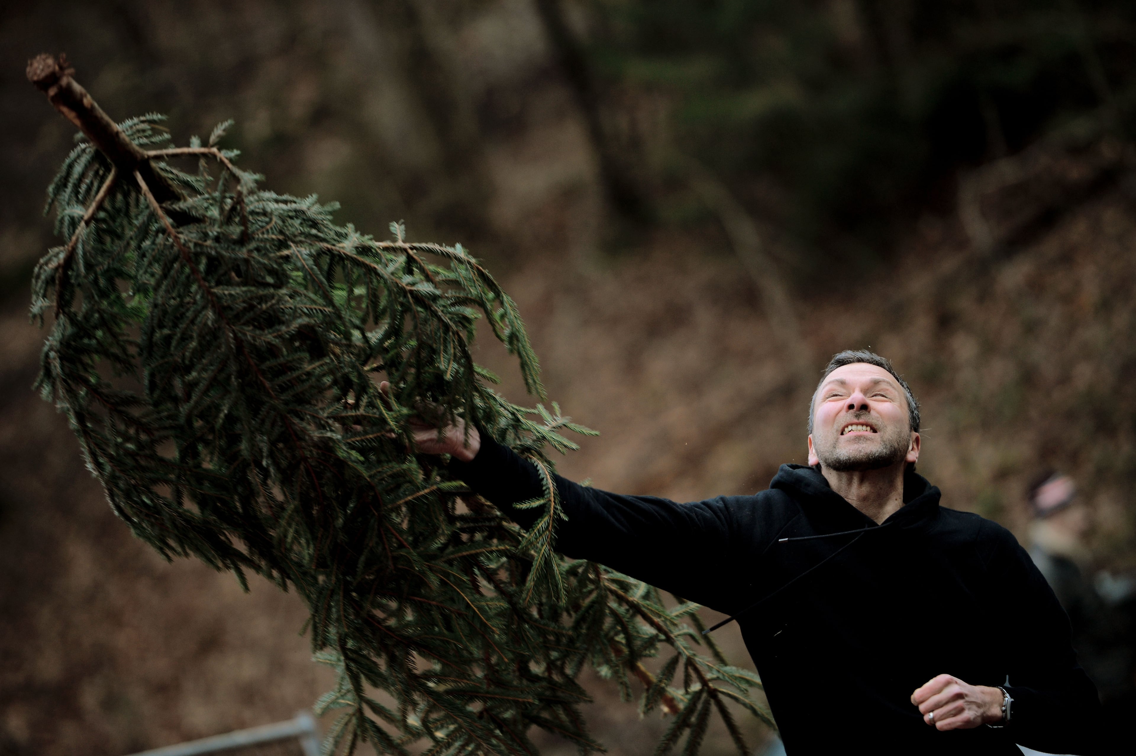 A contestant launches a Christmas tree in the distance discipline of the Christmas Tree Throwing World Championships on Jan. 5, 2013 in Weidenthal, Germany. The less-than-serious annual event is now in its eighth year and features competitions in distance throwing, height throwing and flinging of Christmas trees.