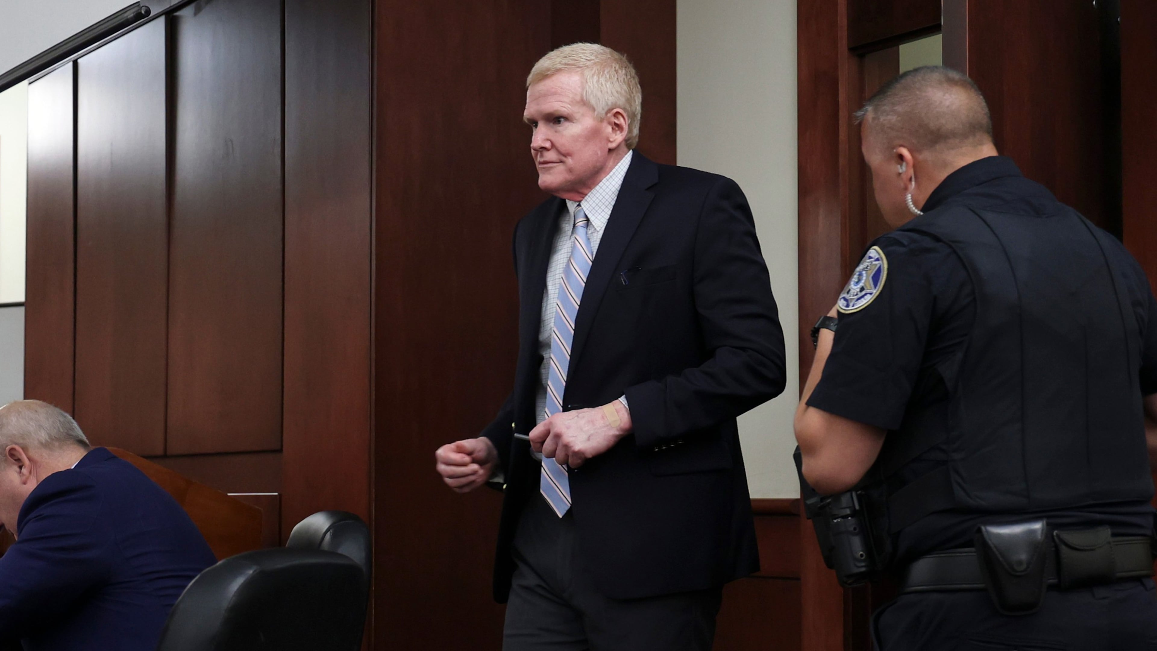 FILE - Alex Murdaugh enters the courtroom for a hearing, Aug. 14, 2026, at the Marc H. Westbrook Judicial Center in Lexington, S.C. (Tracy Glantz/Pool Photo via AP, File)