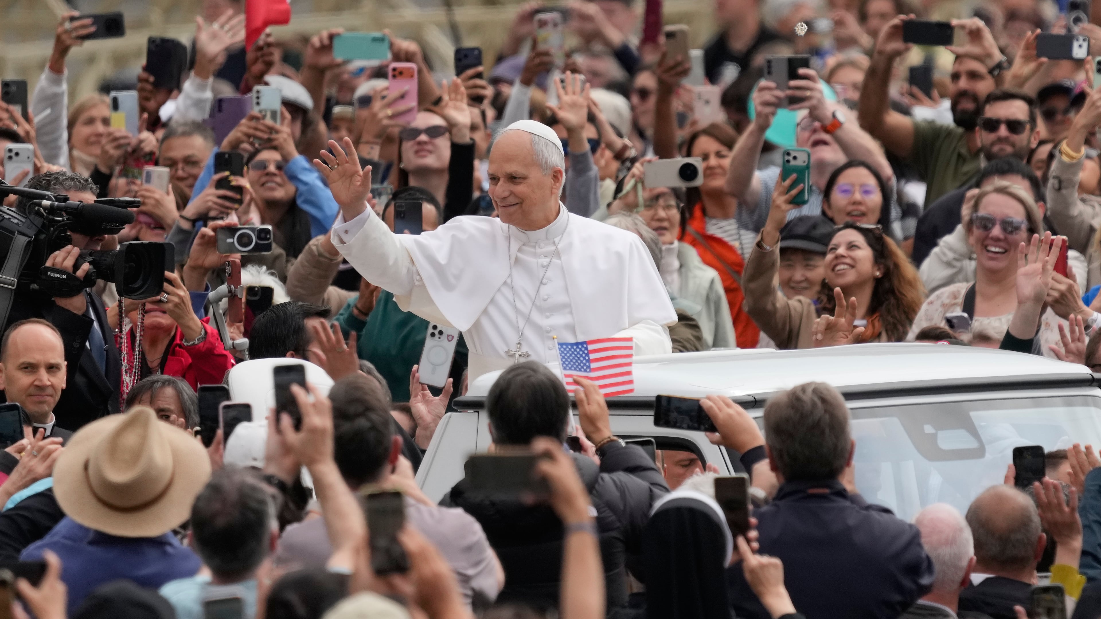Pope Leo XIV arrives as he holds his weekly general audience in St. Peter's Square, at the Vatican, Wednesday, May 6, 2026. (AP Photo/Gregorio Borgia)