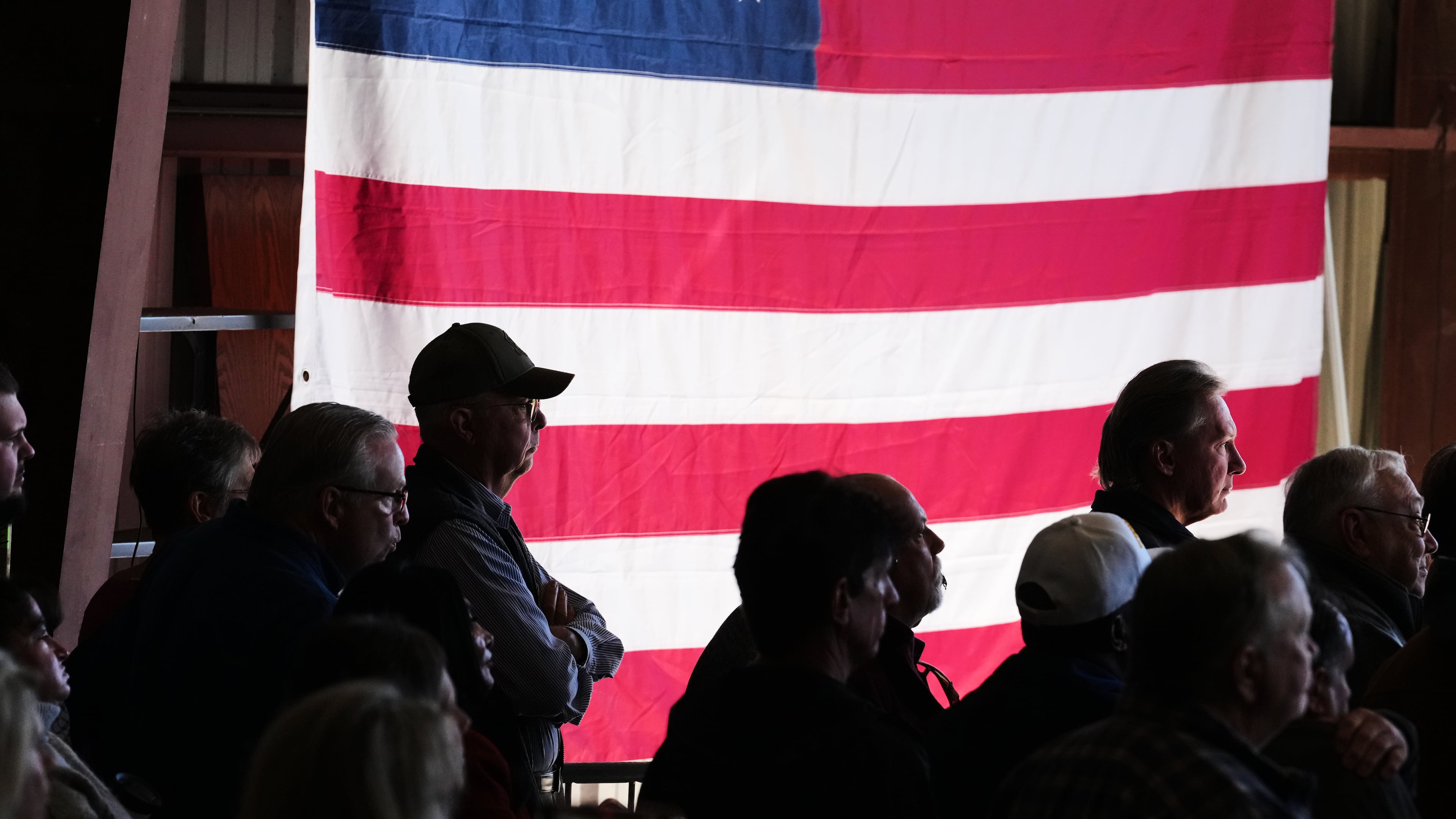 Attendees listen as Republican U.S. Senate candidate Texas Attorney General Ken Paxton speaks at a event kicking off his campaign's bus tour during an event at the Rockwall Municipal Airport Saturday, Oct. 17, 2026, in Rockwall, Texas. (AP Photo/Tony Gutierrez)