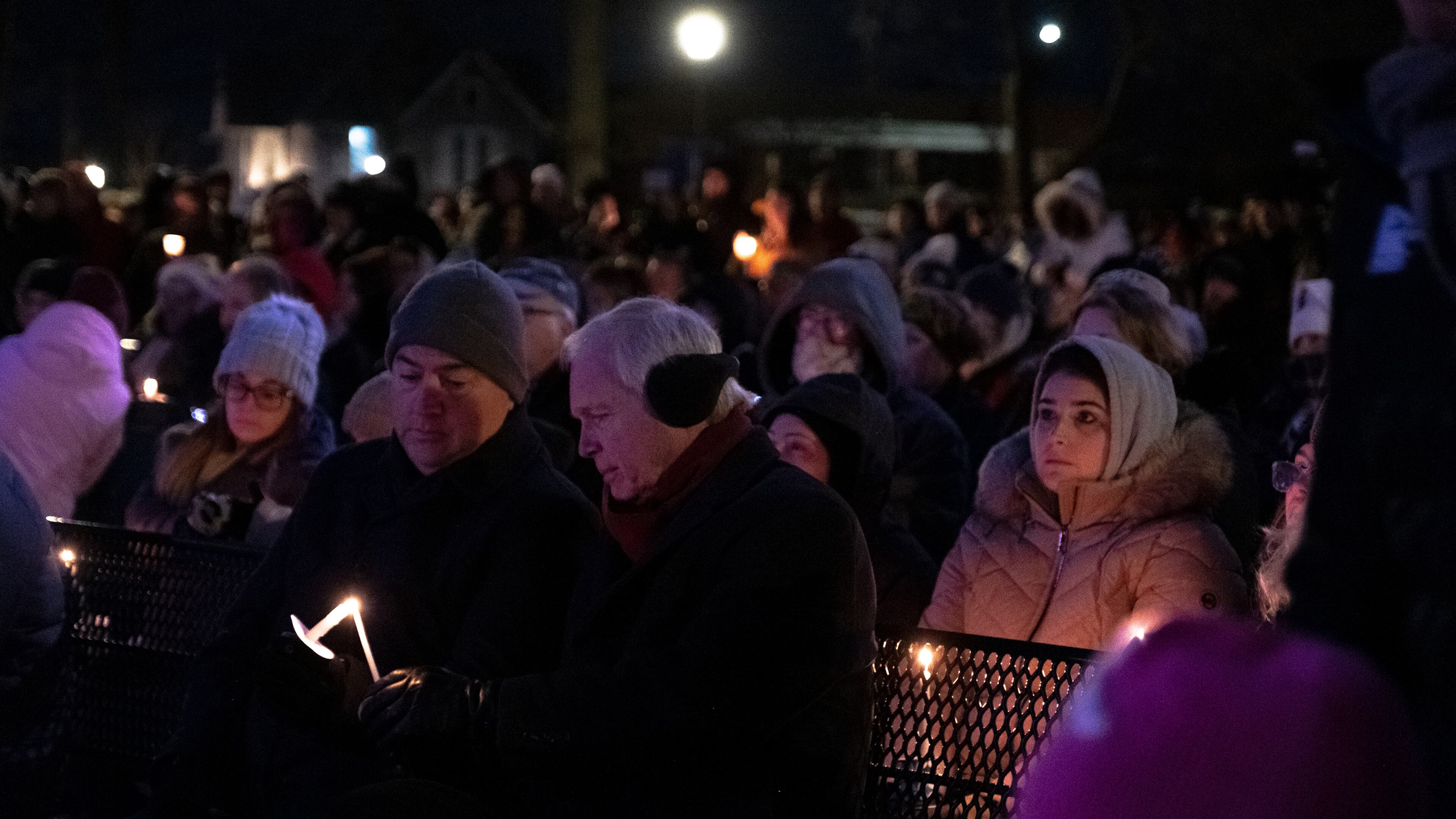 Mourners gather at a candlelight vigil for the victims of last Sunday’s parade attack, at Cutler Park in Waukesha, Wis., on Monday, Nov. 22, 2021. The authorities in Waukesha accused Darrell E. Brooks, 39, of killing six people and wounding more than 60 others in the attack at the parade last Sunday evening. (Mary Mathis/The New York Times)
