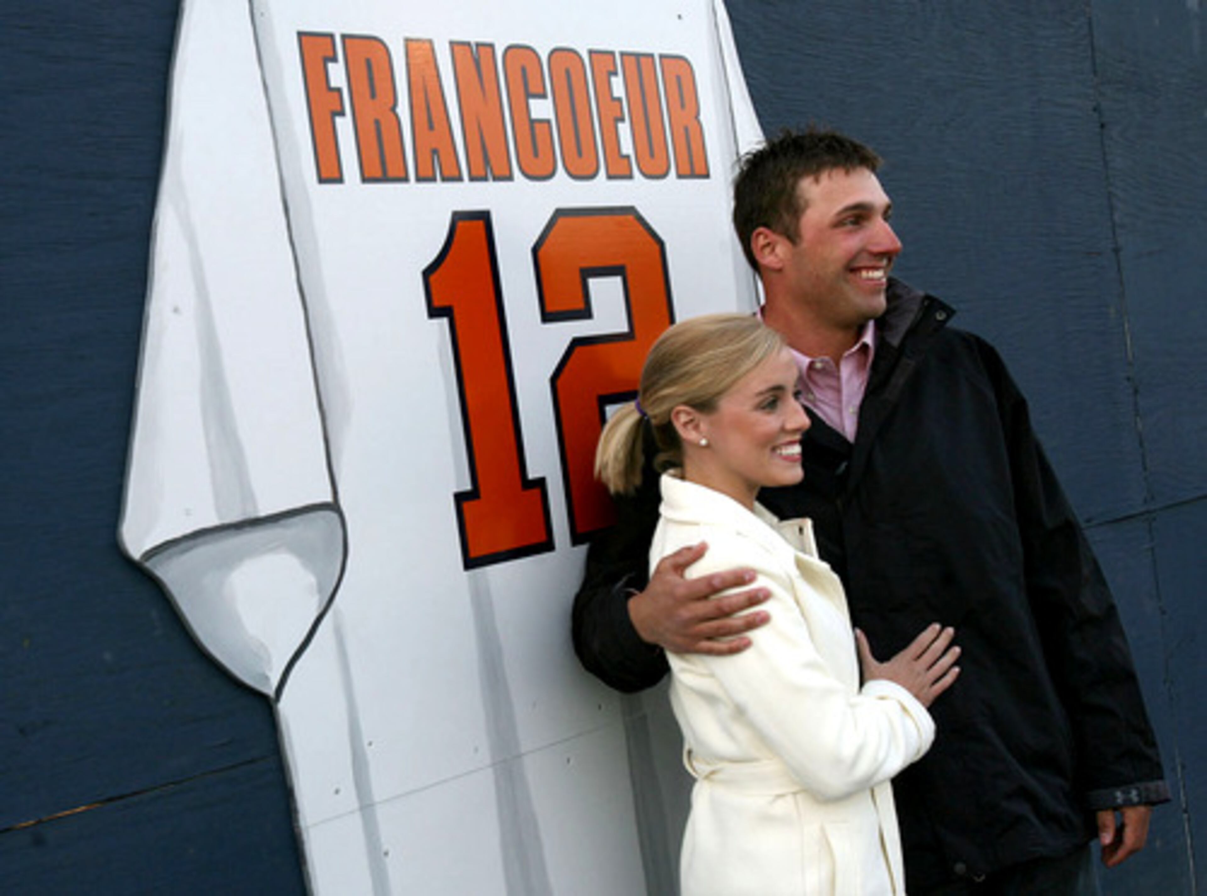 Francoeur and McCoy pose by the outfield fence at Parkview High School where his No. 12 jersey was retired earlier this year. McCoy is an English teacher in Gwinnett County's Mill Creek High School.