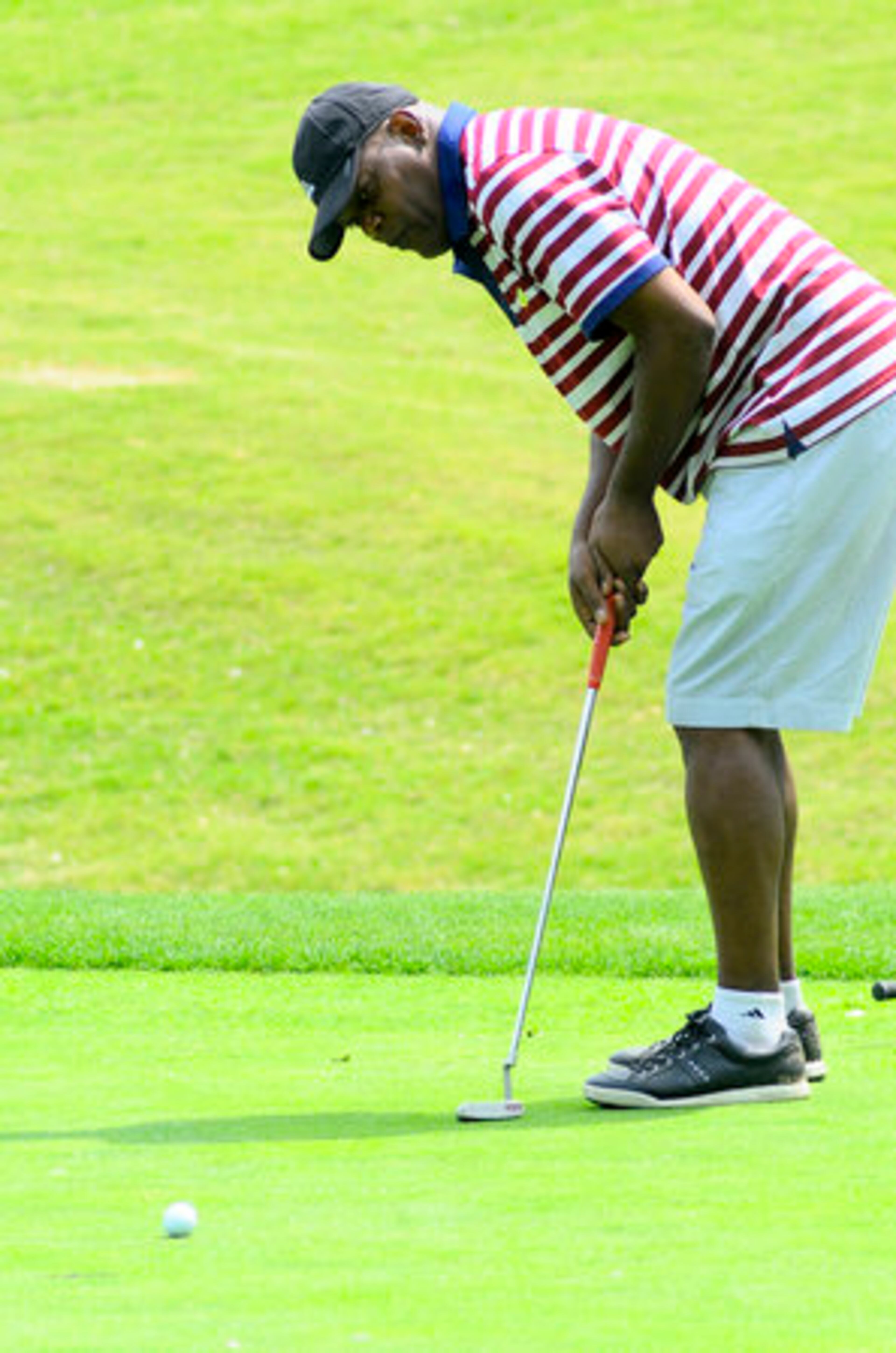 Sameul L. Jackson watches as he misses a putt for an eagle on the 9th hole.