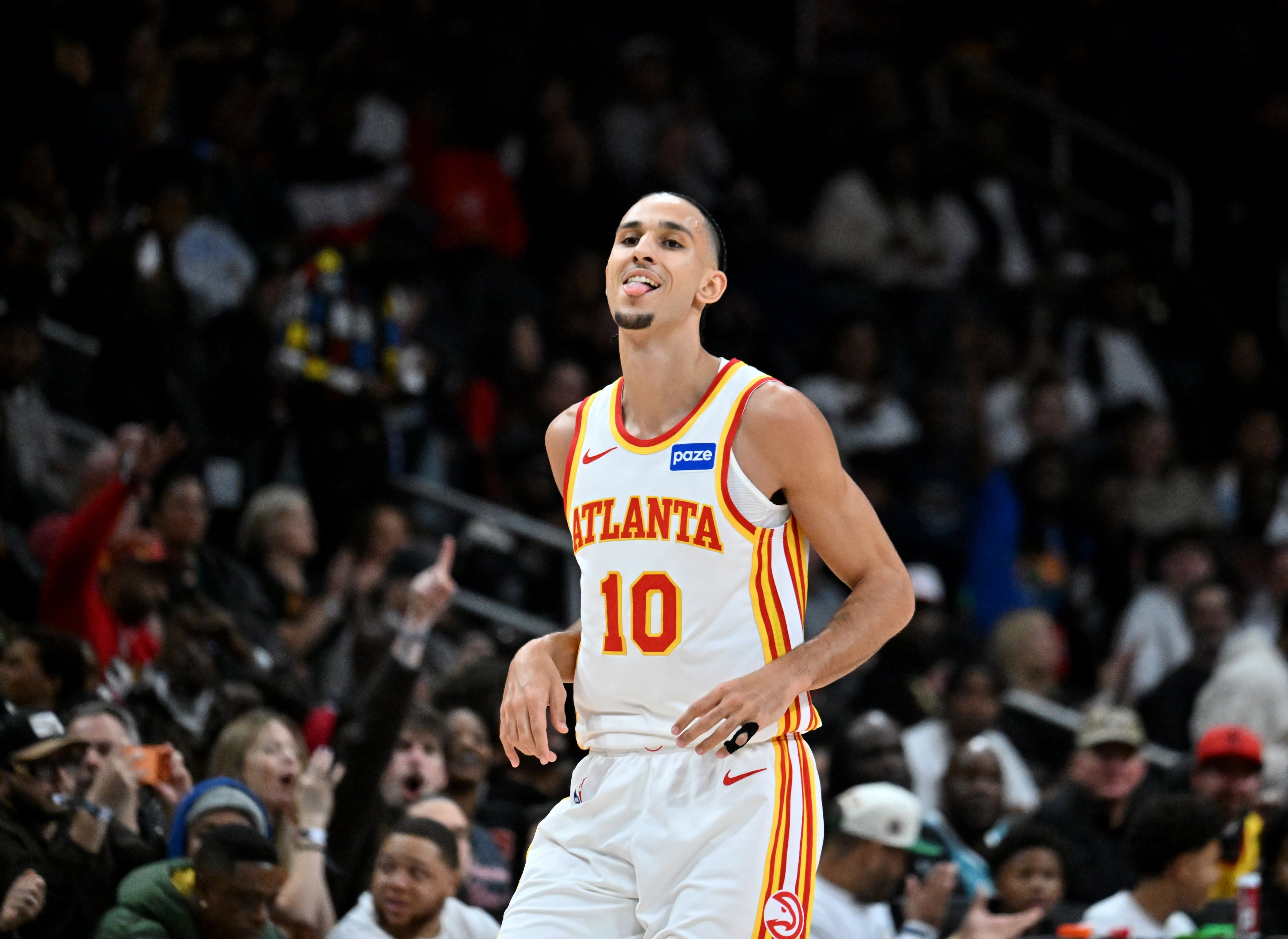 Atlanta Hawks forward Zaccharie Risacher (10) reacts after scoring during the first half in an NBA basketball game at State Farm Arena, Wednesday, Jan. 7, 2026, in Atlanta. (Hyosub Shin/AJC)