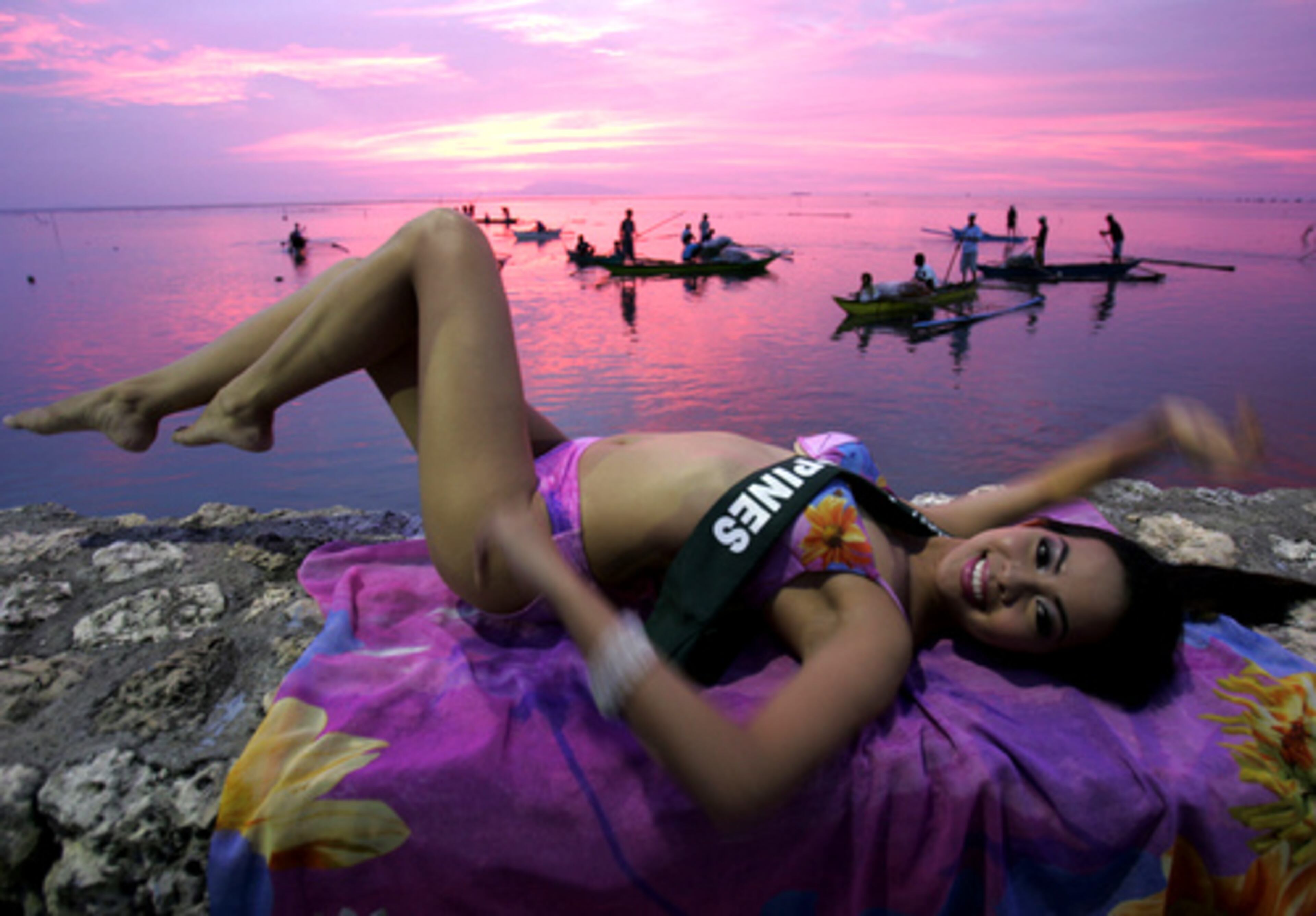 The Philippines Jeanne Haru poses for the 2007 Miss Earth beauty pageant at sunset at the Golden Sunset Resort at Calatagan, Batangas province about 110 kilometers south of Manila, Philippines Saturday Oct. 27, 2007.