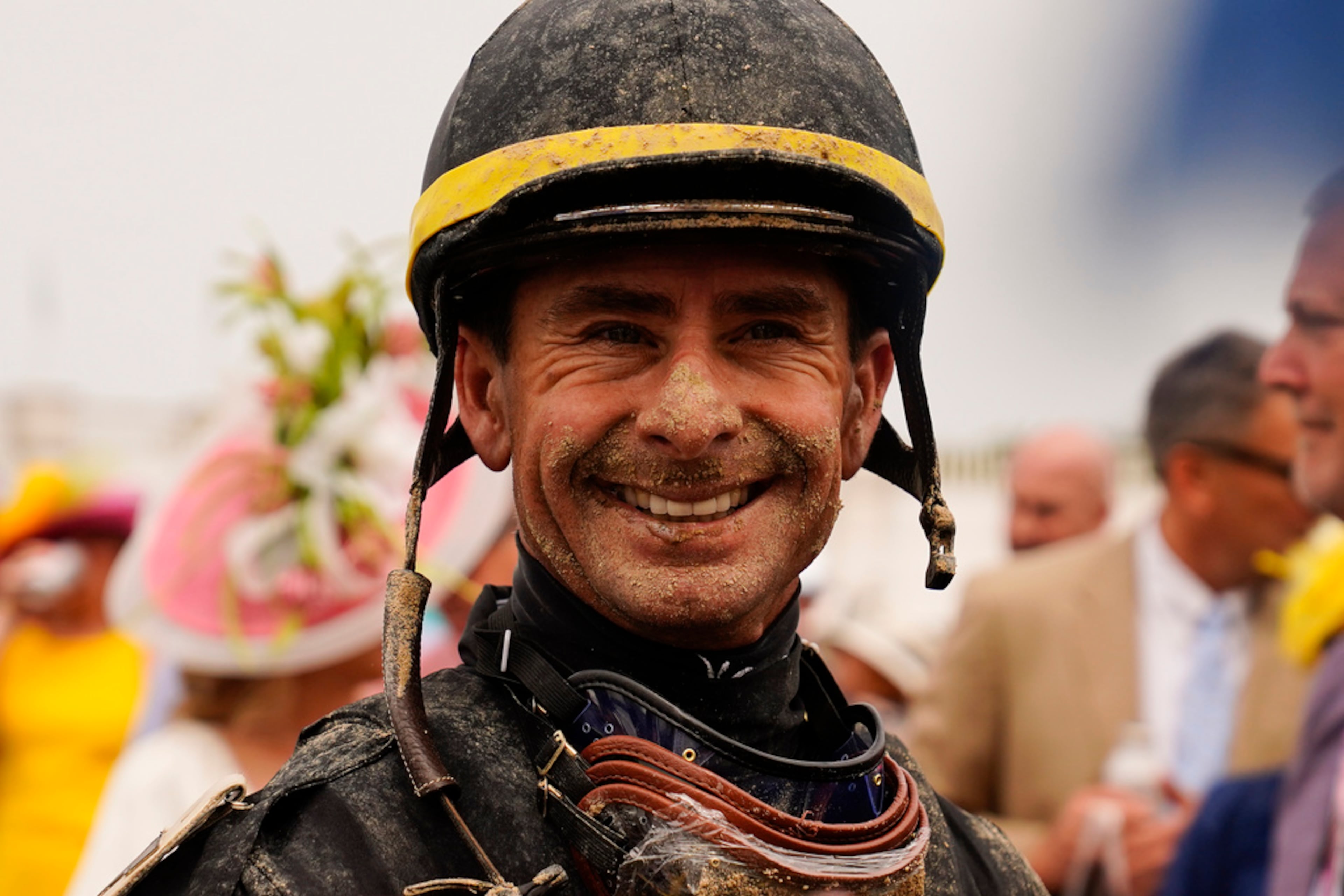 Jockey Corey Lanerie smiles after finishing a horse race at Churchill Downs Saturday, May 6, 2023, in Louisville, Ky. (AP Photo/Brynn Anderson)