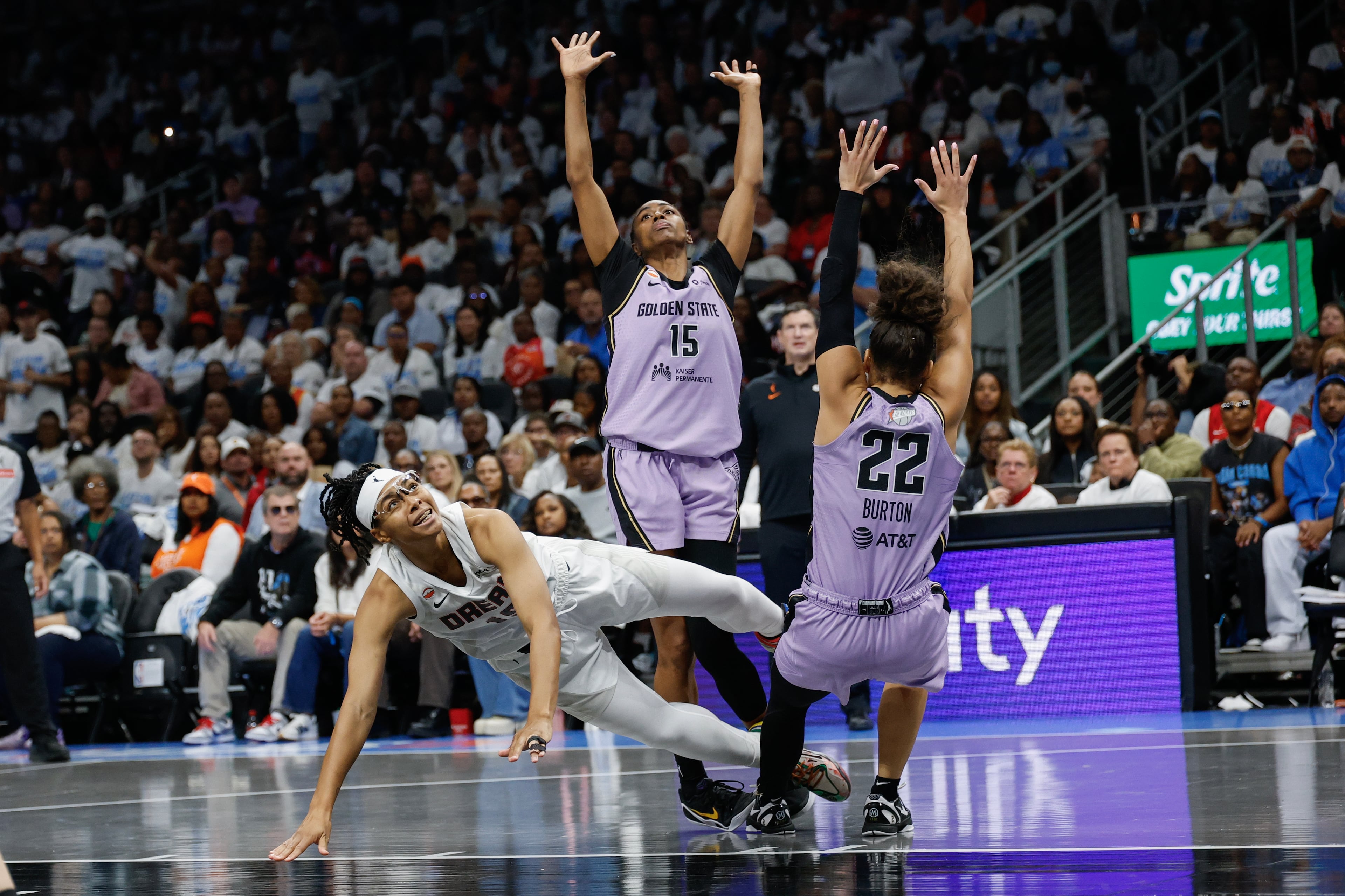 Atlanta Dream guard Allisha Gray is defended by Golden State Valkyries guard Veronica Burton (right) and guard Tiffany Hayes during the second half of Game 4 of the WNBA Finals between the Atlanta Dream and the Golden State Valkyries, Saturday, Oct. 24, 2026, in Atlanta. (Erik S. Lesser for the AJC)
