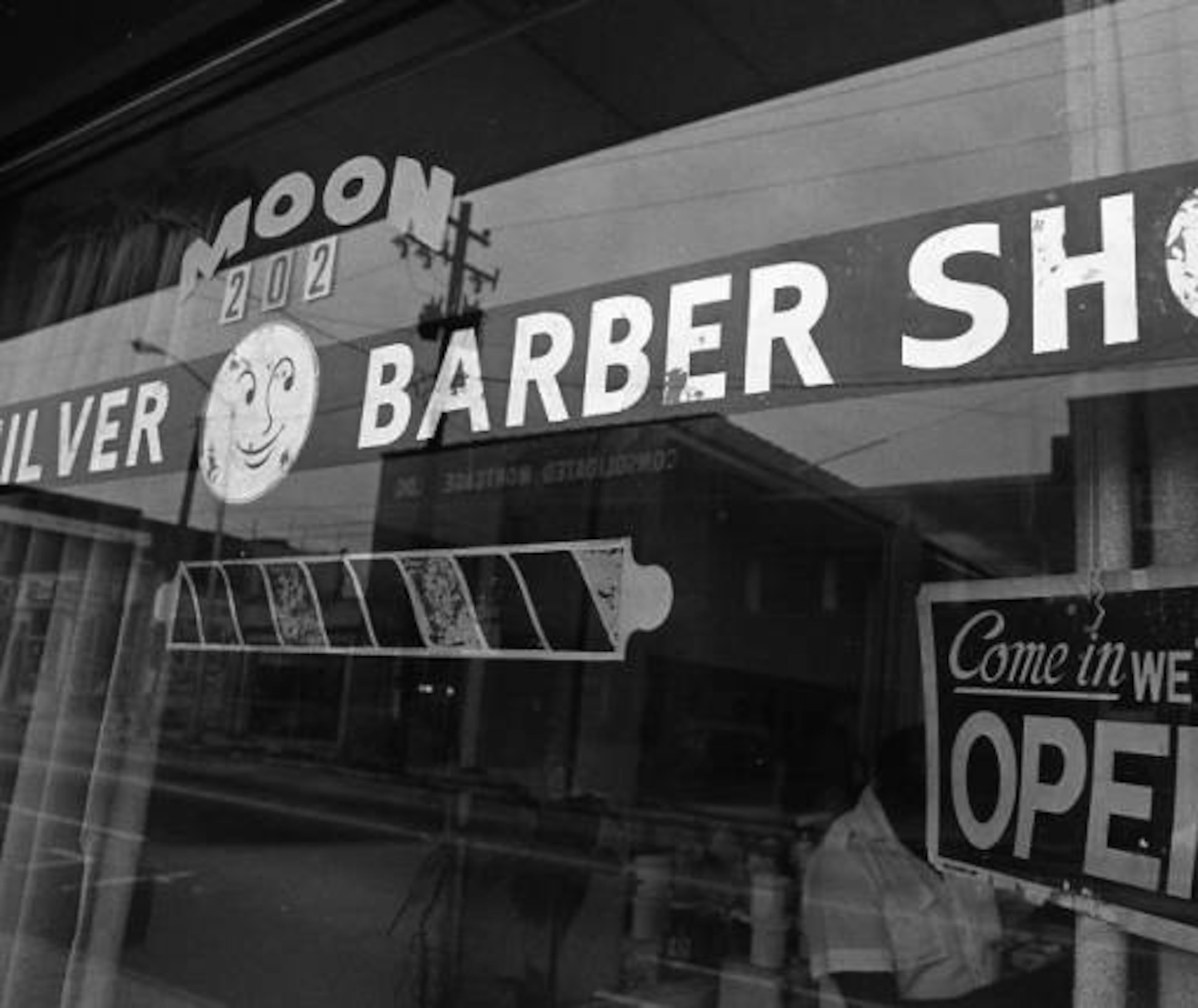 The sign at the Silver Moon barbershop in the early '80s.