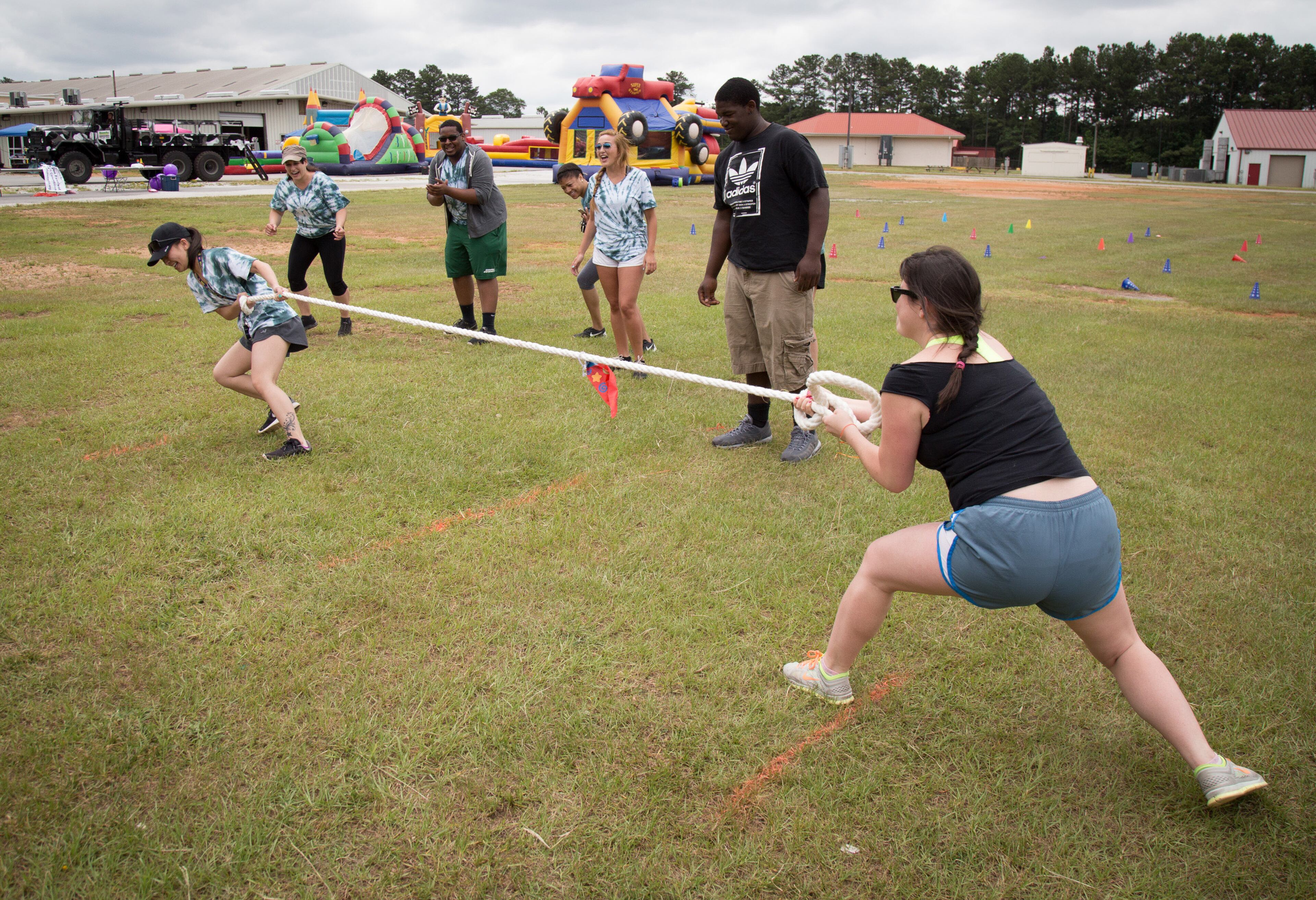 Teams compete in a tug-of-war competition during the Lift Up Summer Fun Festival on Saturday, June 18, 2016, in Lawrenceville, Ga. To enter in the competition, teams donated school supplies that will go to homeless and low-income families. STEVE SCHAEFER / SPECIAL TO THE AJC