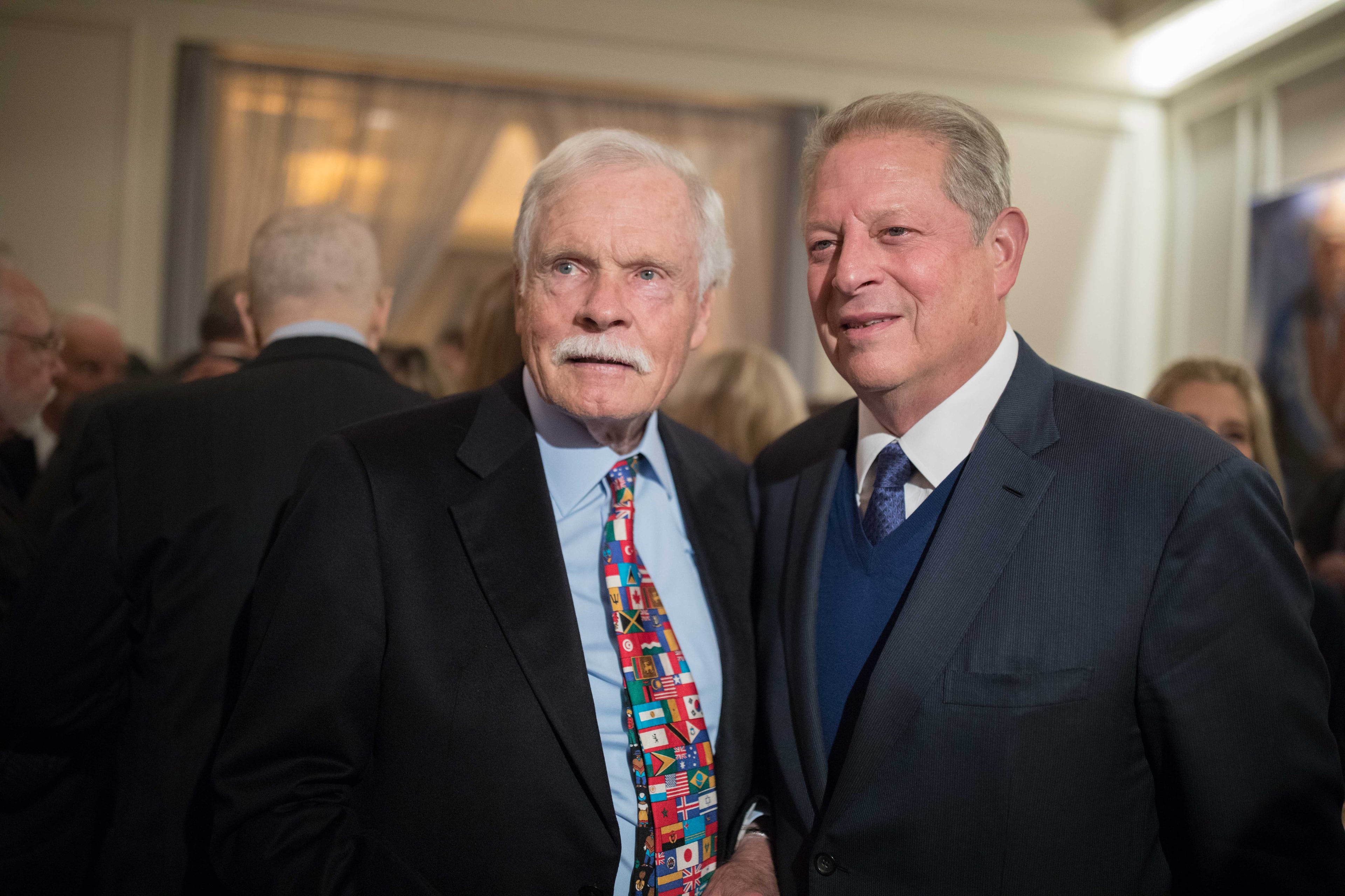 Ted Turner poses for a photo with former Vice President Al Gore during Turner's 80th birthday party at the St. Regis Atlanta hotel on Saturday, Nov. 17, 2018, in Atlanta. Turner, who recently announced he has Lewy body dementia, turns 80 on Monday. (Photo: BRANDEN CAMP/SPECIAL TO THE AJC)