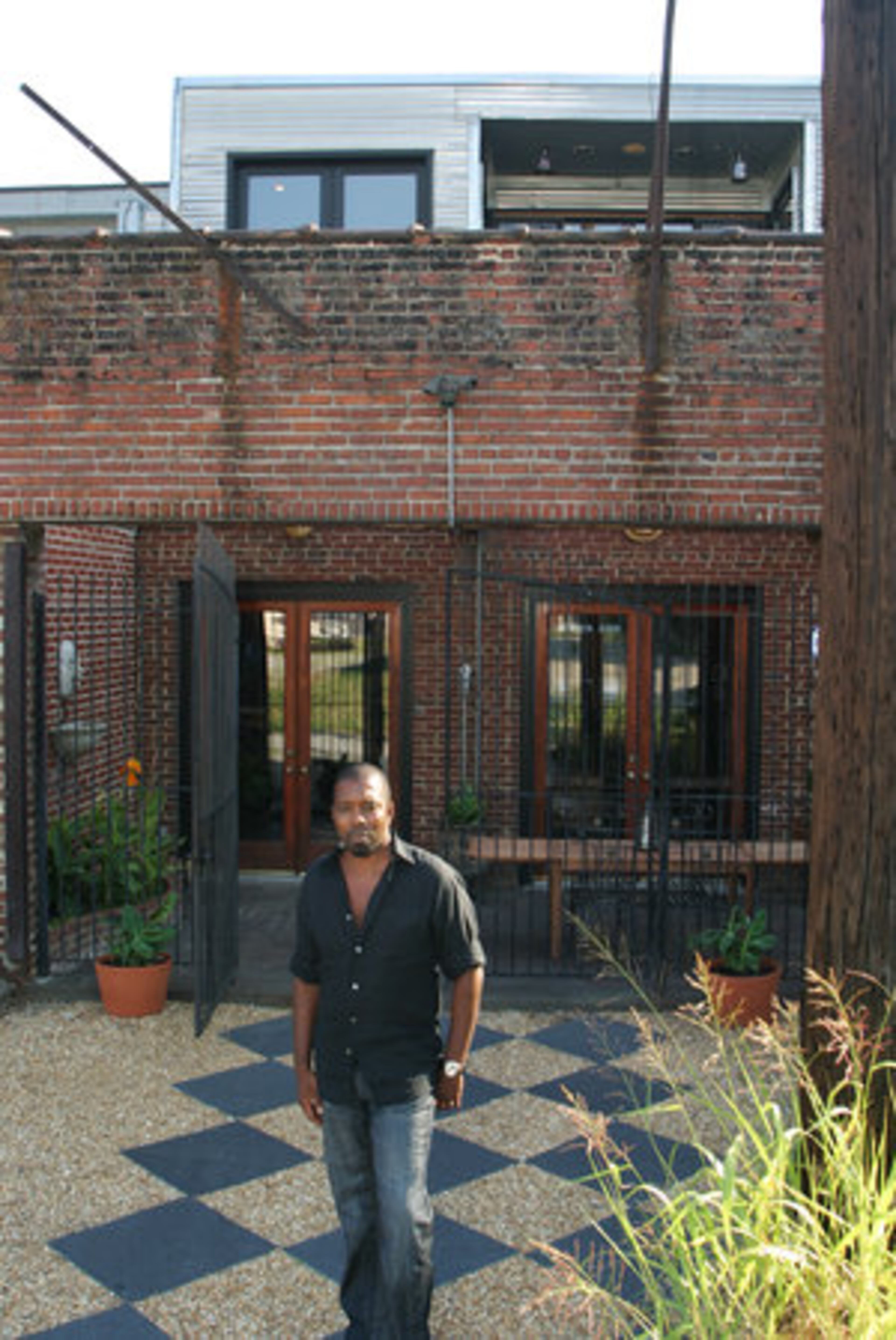 When Alex Hunte, a project management consultant, moved into this Castleberry Hill loft, it had 1,400 square feet of space. He added a second floor, creating a three-bedroom, three-bath home with 3,000 square feet of space.