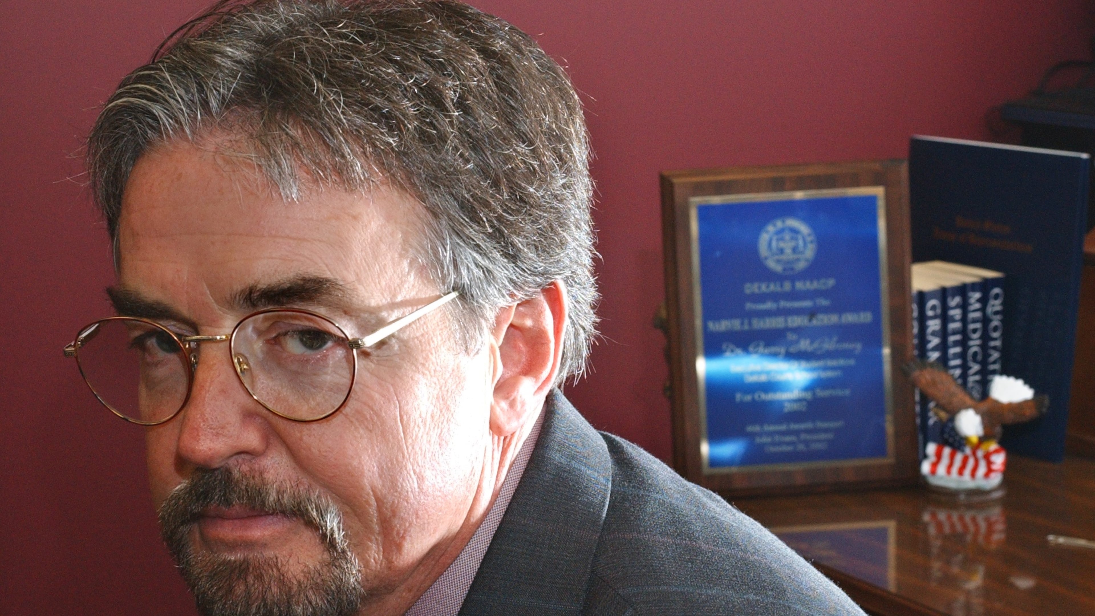 Former state Department of Education leader Garry McGiboney has received many recognitions in his 42-year career, incuding being recognized in 2002 by the NAACP for his work on alternative schools. (Renee Hannans/AJC)