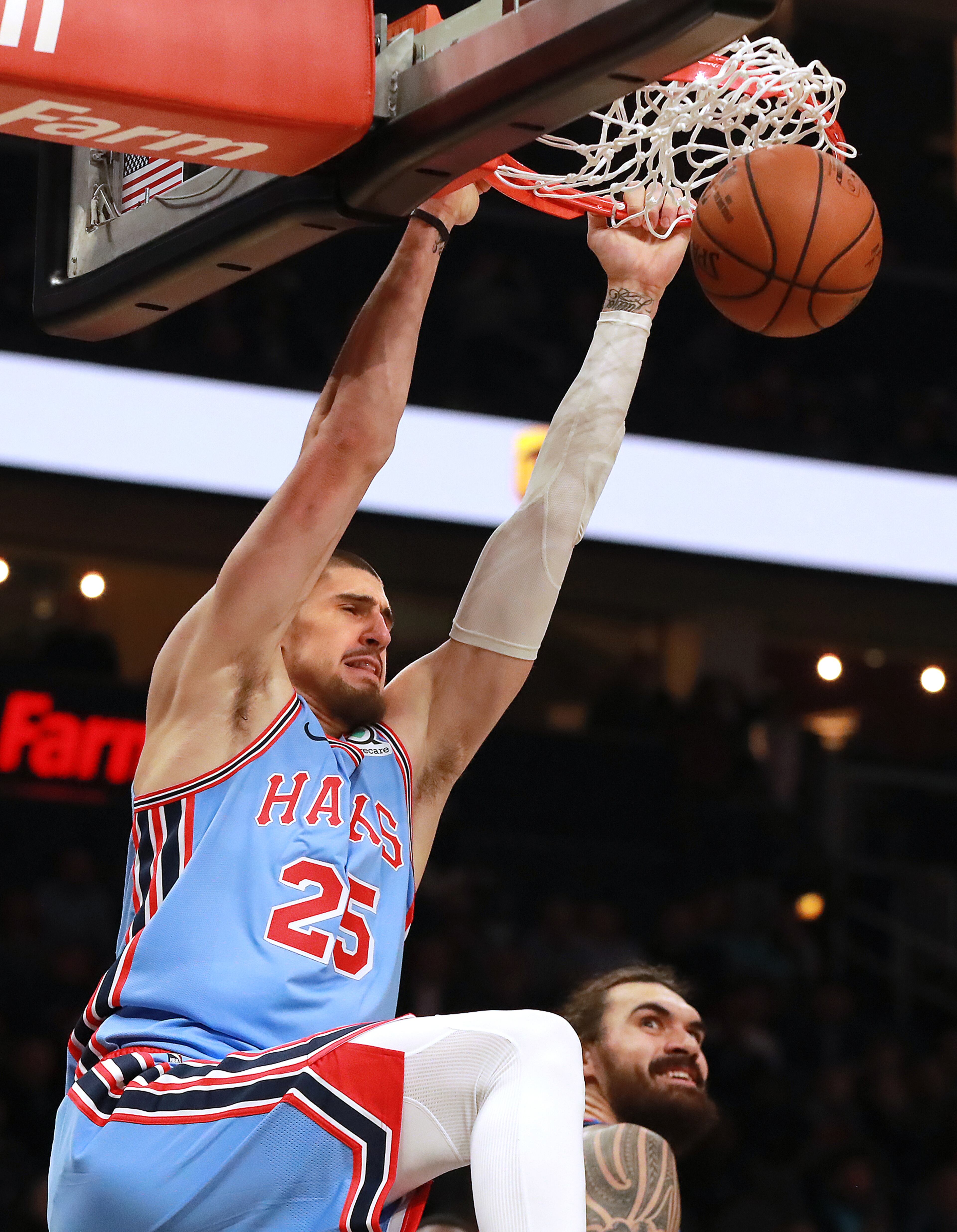 Jan. 15, 2019 Atlanta: Atlanta Hawks center Alex Len slams for two against the Oklahoma City Thunder during the first half in a NBA basketball game on Tuesday, Jan. 15, 2019, at State Farm Arena in Atlanta. Curtis Compton/ccompton@ajc.com