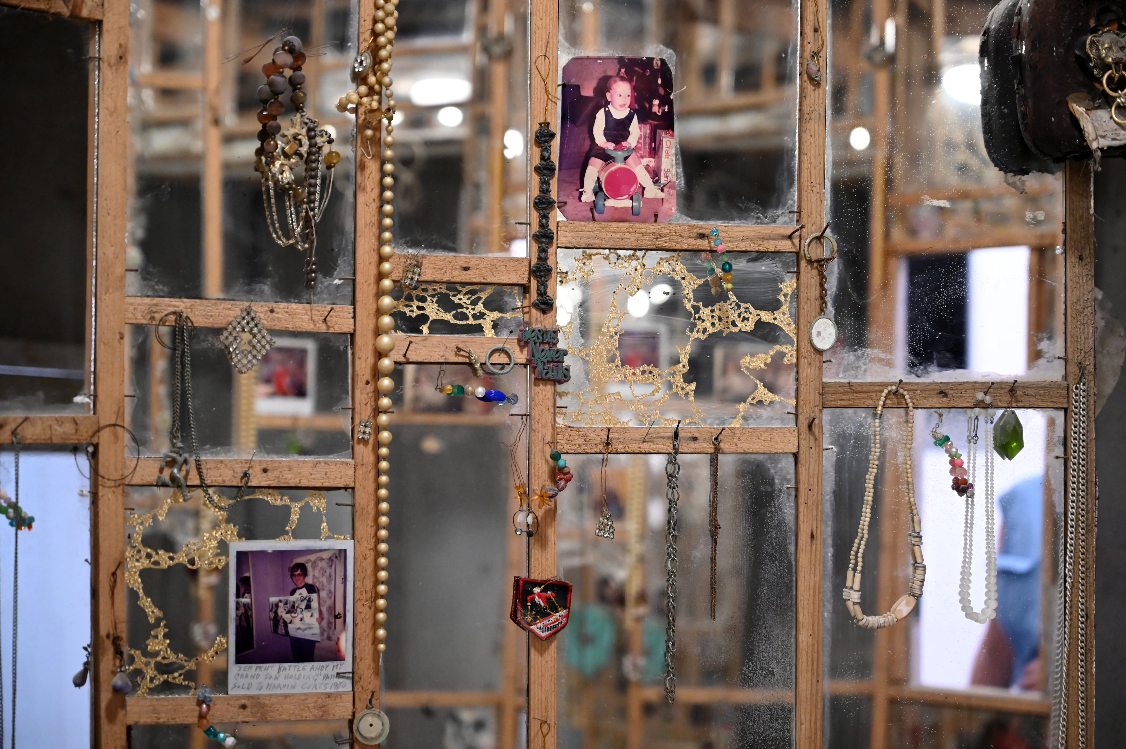 Decorative details adorn the walls inside the spiral staircase of Howard Finster's World Folk Art Church on August 29, 2025 in Summerville. (Hyosub Shin / AJC)