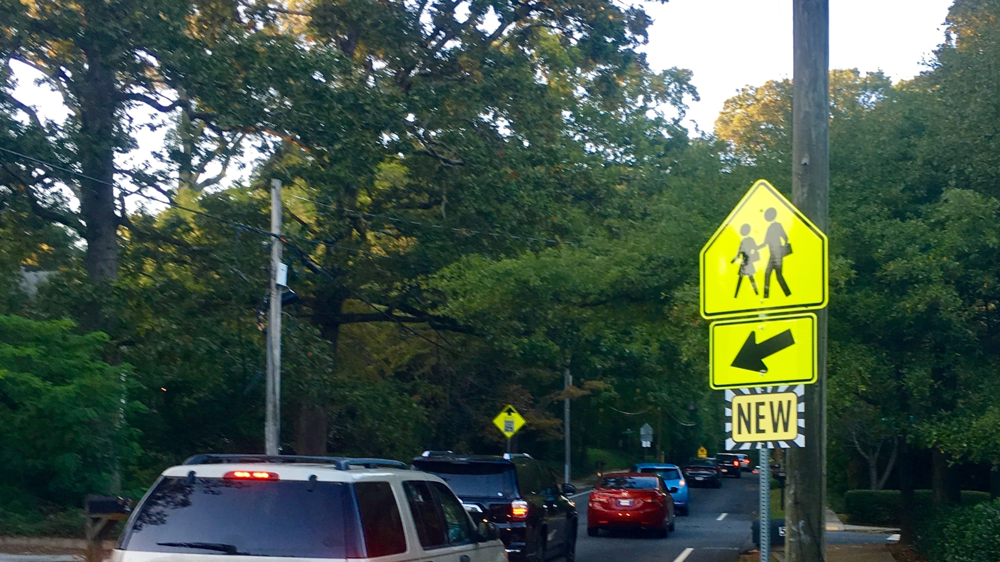The school safety zone on this stretch of South Candler Street has recently been expanded from .21 miles to .42 miles, and now also includes both Winnona Park Elementary and Renfroe Middle. These changes have been long sought for by the neighborhood surrounding this road which is almost always busy, even on an early Saturday evening when this photo was taken. Bill Banks for the AJC