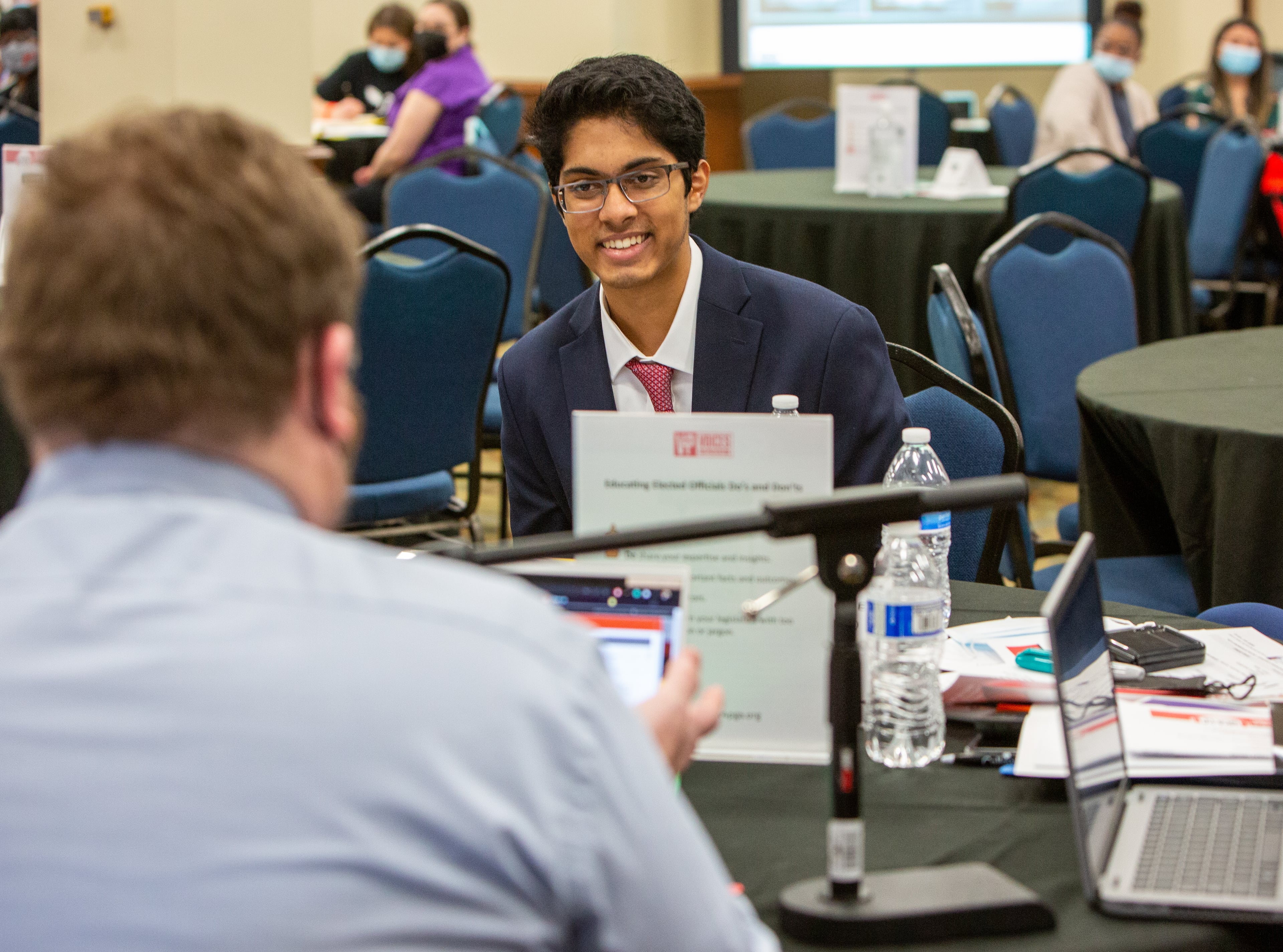 Vinayak Menon talks with the moderator during the recent Voices for Prevention Substance Abuse Prevention Day at the Georgia Capitol event in Atlanta. PHIL SKINNER FOR THE ATLANTA JOURNAL-CONSTITUTION.