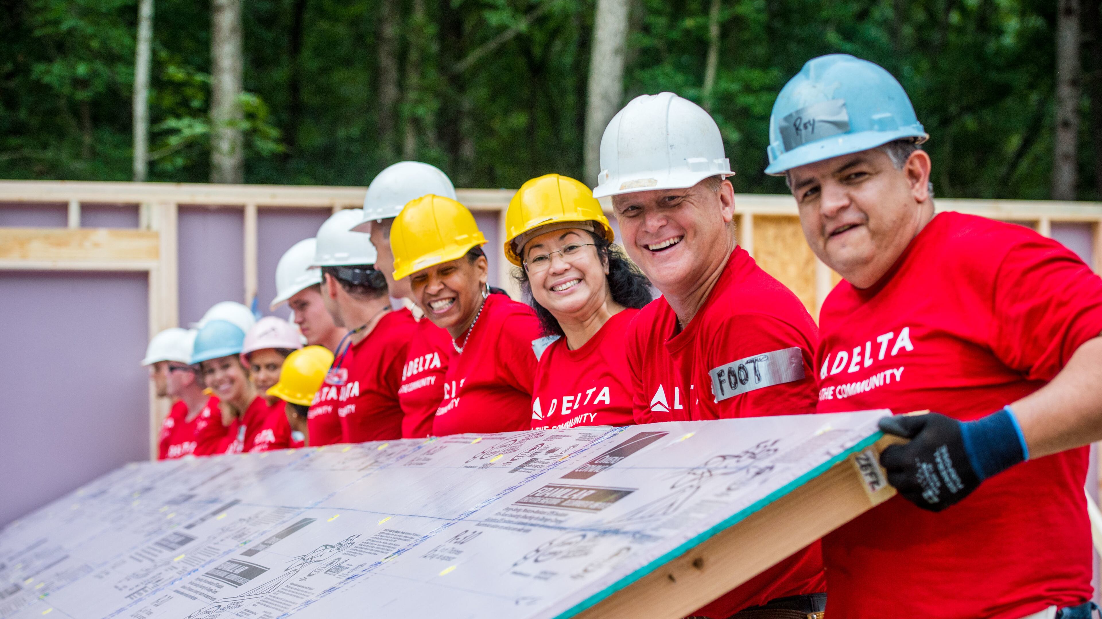 Delta Air Lines employees volunteer with Habitat for Humanity to build homes in Atlanta on Thursday, Sept. 6, 2018.