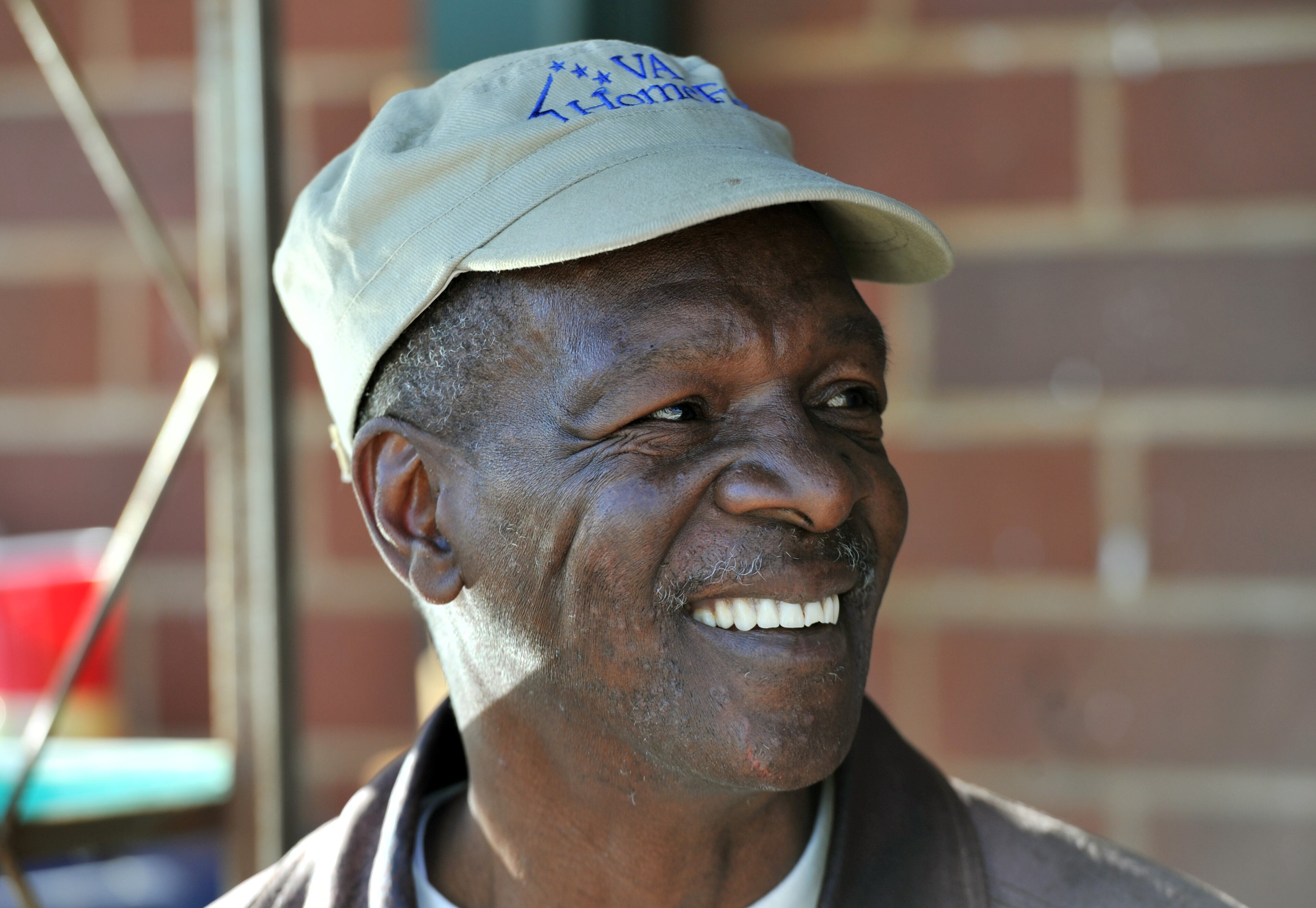 Ronald Sample smiles as he takes a smoke break at Furniture Bank of Metro Atlanta. Sample is an Air Force veteran who was diagnosed with Post Traumatic Stress. He is working Furniture Bank of Metro Atlanta has a program with the United Way where they employ homeless veterans to help them get experience in their warehouse. The program is usually a two-month internship and helps them with skills to find permanent employment. This is part of the national effort by the VA to end homelessness among veterans. HYOSUB SHIN / HSHIN@AJC.COM