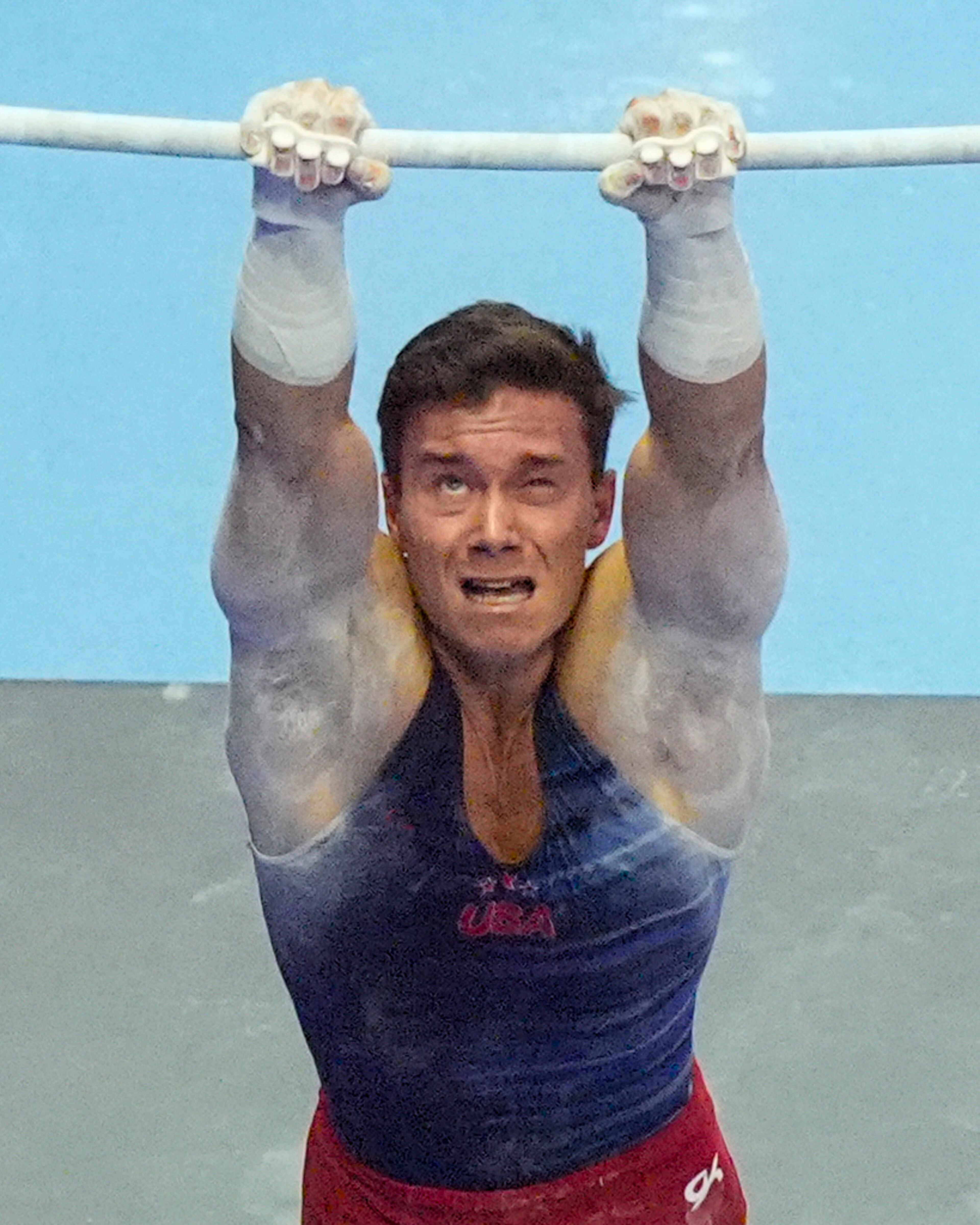 Brody Malone competes on the horizontal bar at the United States Gymnastics Olympic Trials on Thursday, June 27, 2024 in Minneapolis. (AP Photo/Charlie Riedel)