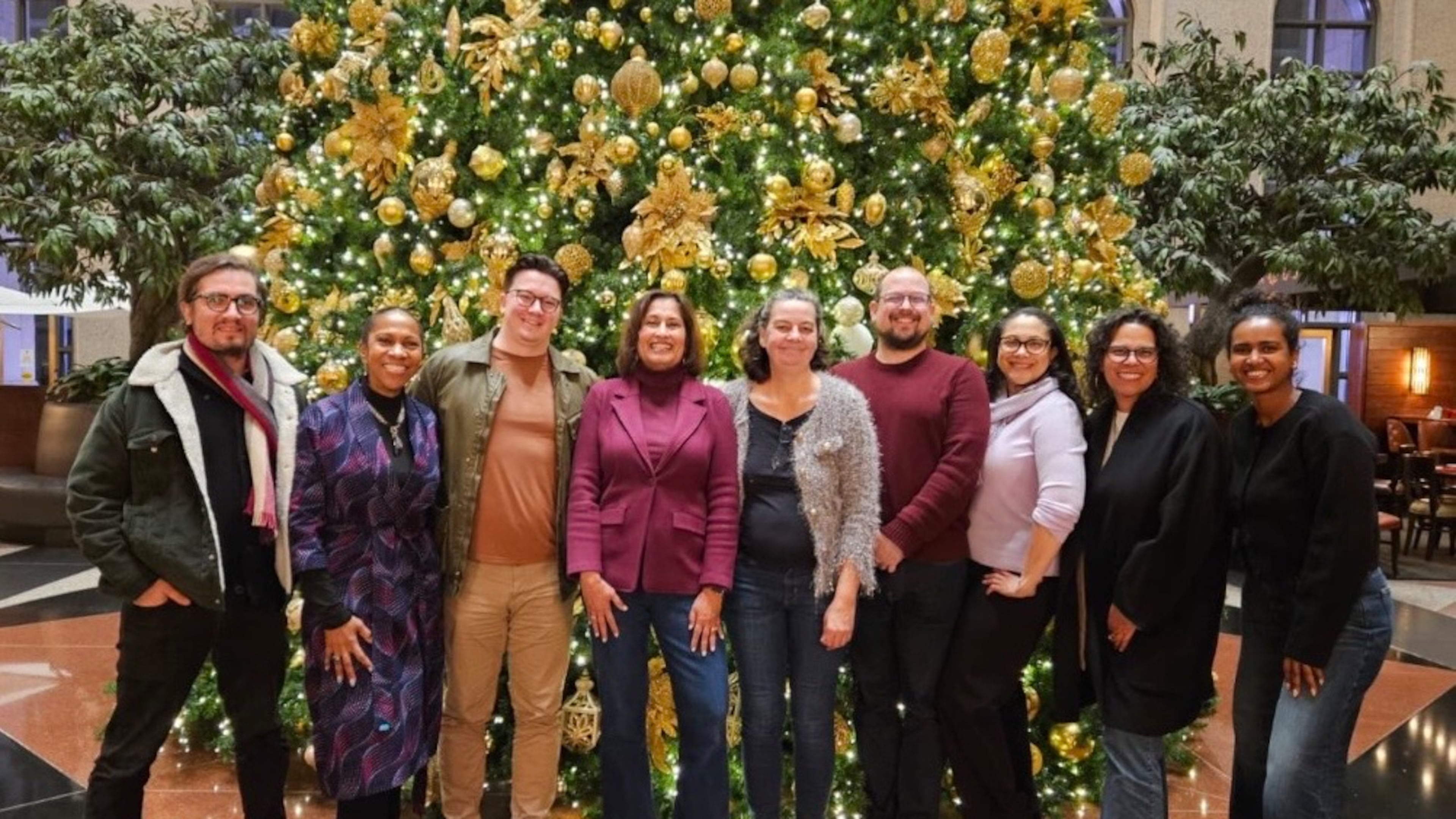 The staff of Atlanta Civic Circle gathers at its annual Christmas dinner in 2025. (Courtesy of Saba Long)