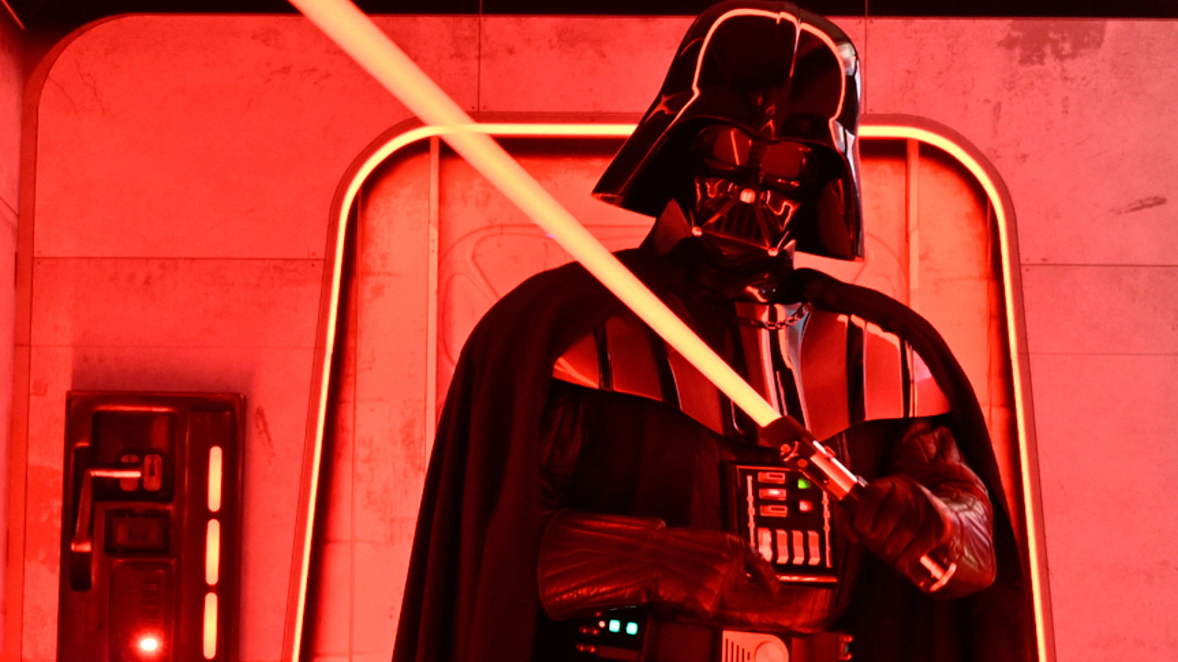 FILE - A Darth Vader costumed character poses at the Hasbro and Amazon Star Wars interactive Imperial March experience at the Empire State Building March 21, 2024, in New York. (Photo by Evan Agostini/Invision/AP, File)