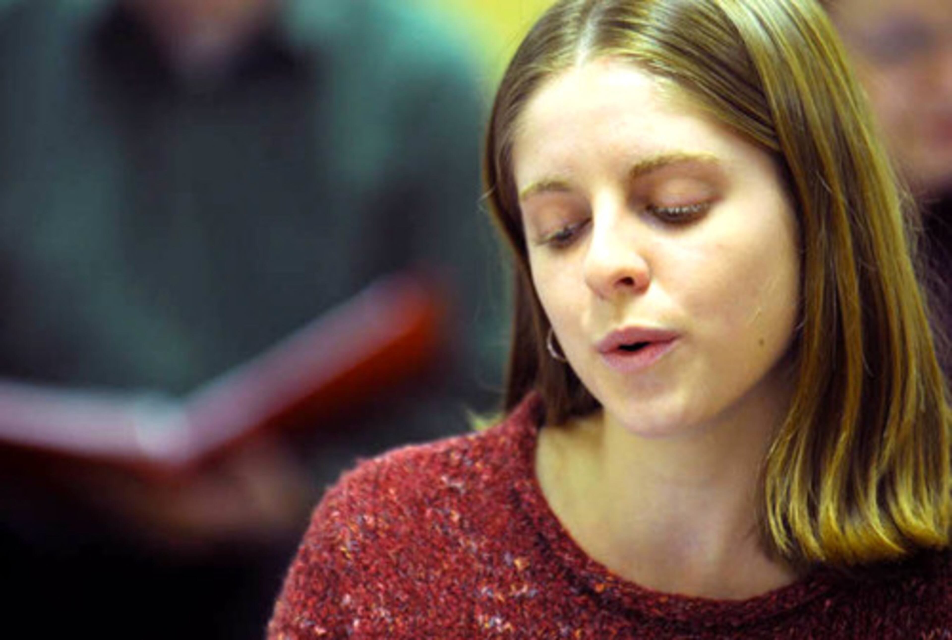 Soprano soloist Laura Withers, who has a solo in the original choral piece, "In the Garden" by James Stevenson, sings during choir practice at St. Dunstan's Episcopal church in Sandy Springs.