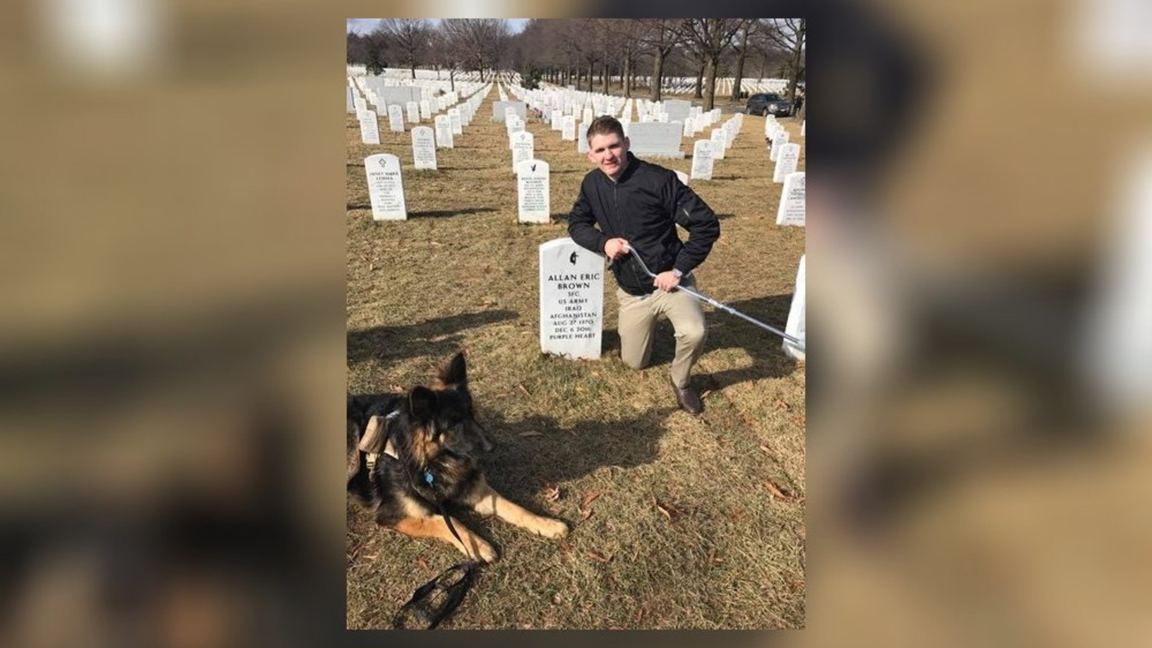 E-4 Specialist Winston Hencely at the grave of Sgt. Allan Brown, who died from injuries suffered in the November 12, 2016 suicide bombing attack in Afghanistan that left Hencely disabled.