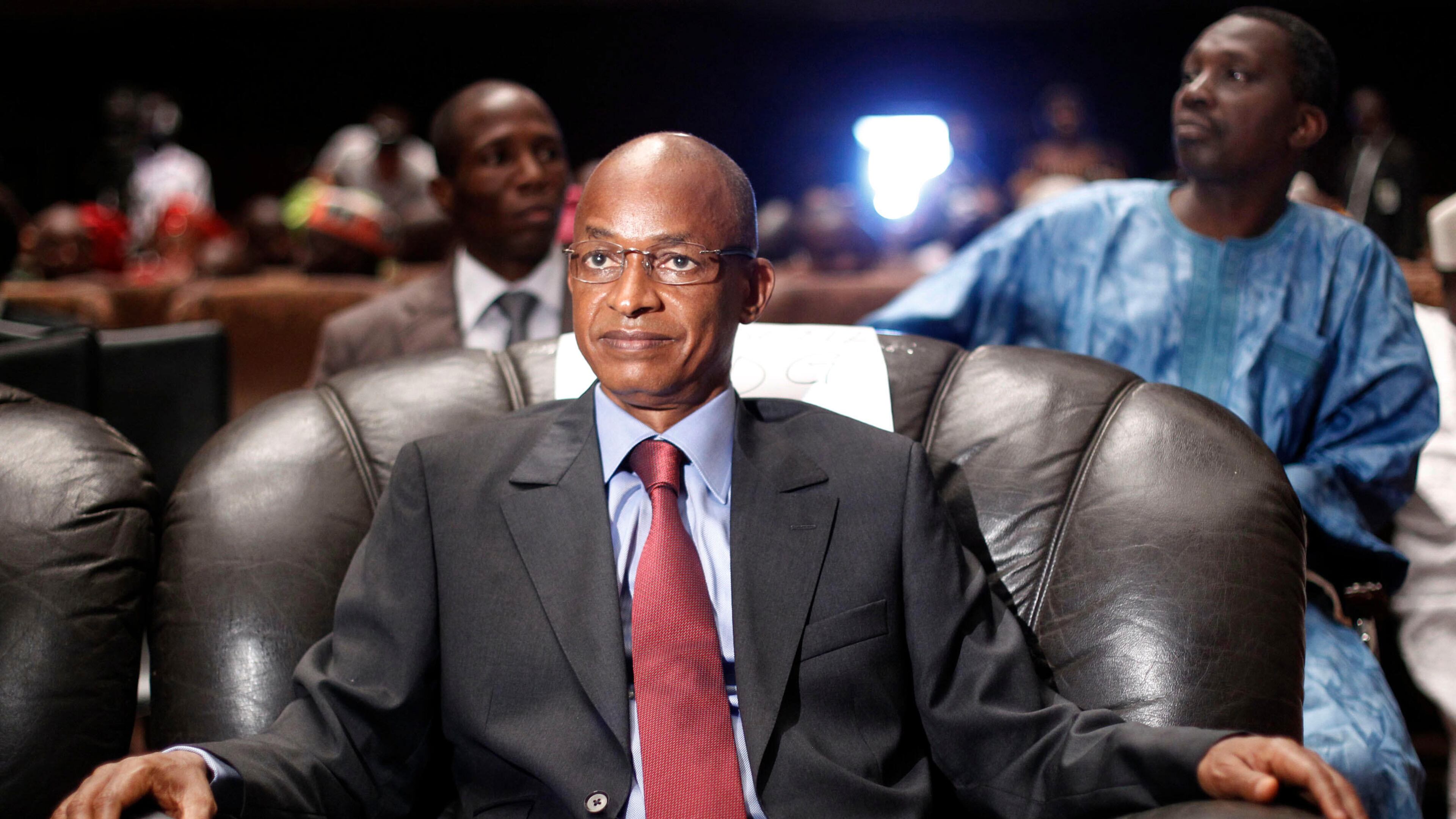 FILE - Cellou Dalein Diallo sits at the People's Hall in Conakry, Guinea, Sept 21, 2010. (AP Photo/Jerome Delay, file)