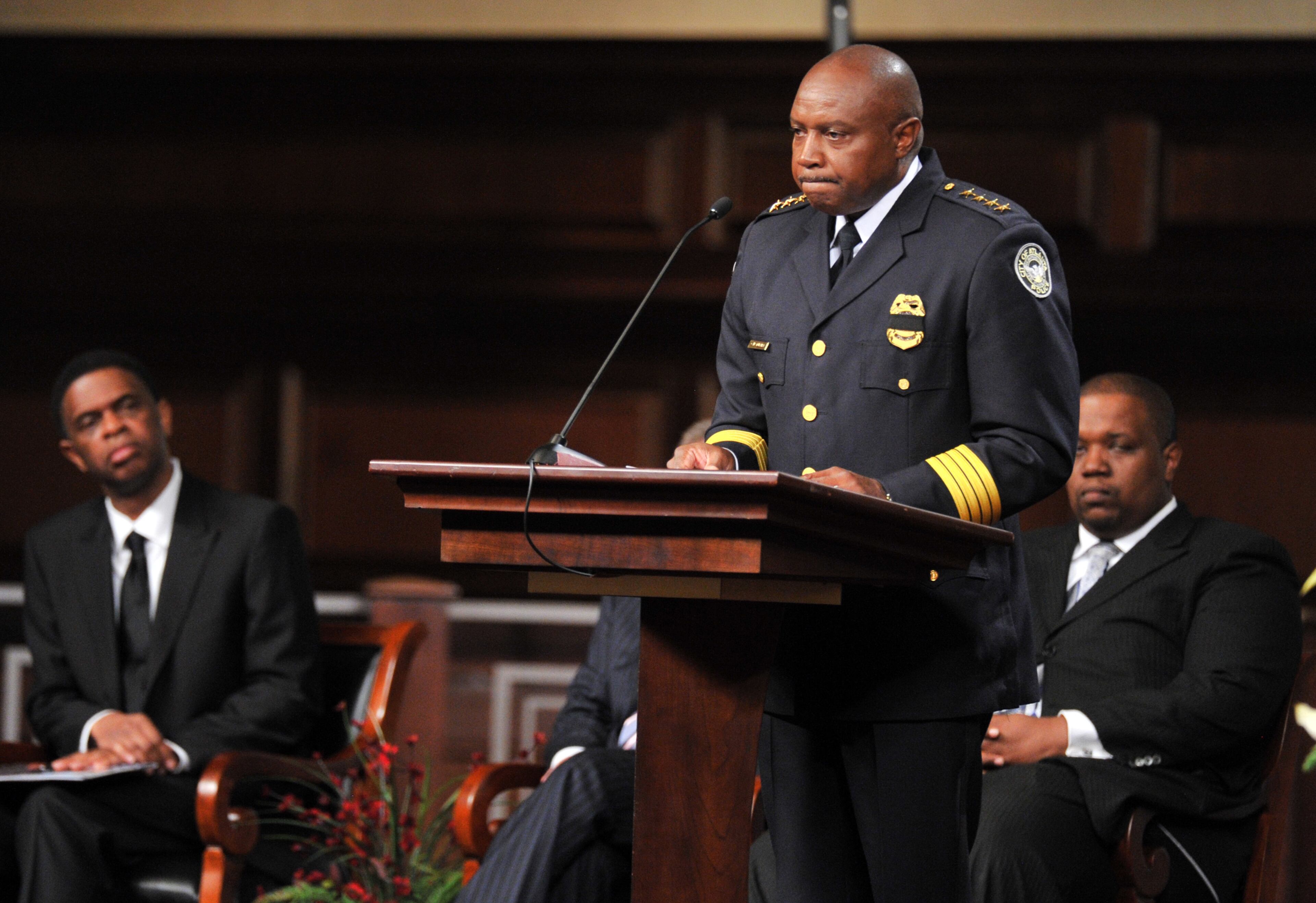 Atlanta Police Chief George Turner pauses as he gives remarks during APD Officer Shawn Smiley's funeral at First Baptist Church of Atlanta on Saturday, November 10, 2012. APD Officer Shawn Smiley was in the passenger seat last weekend when an APD helicopter searching for a missing 9-year-old boy crashed in Atlanta. HYOSUB SHIN / HSHIN@AJC.COM