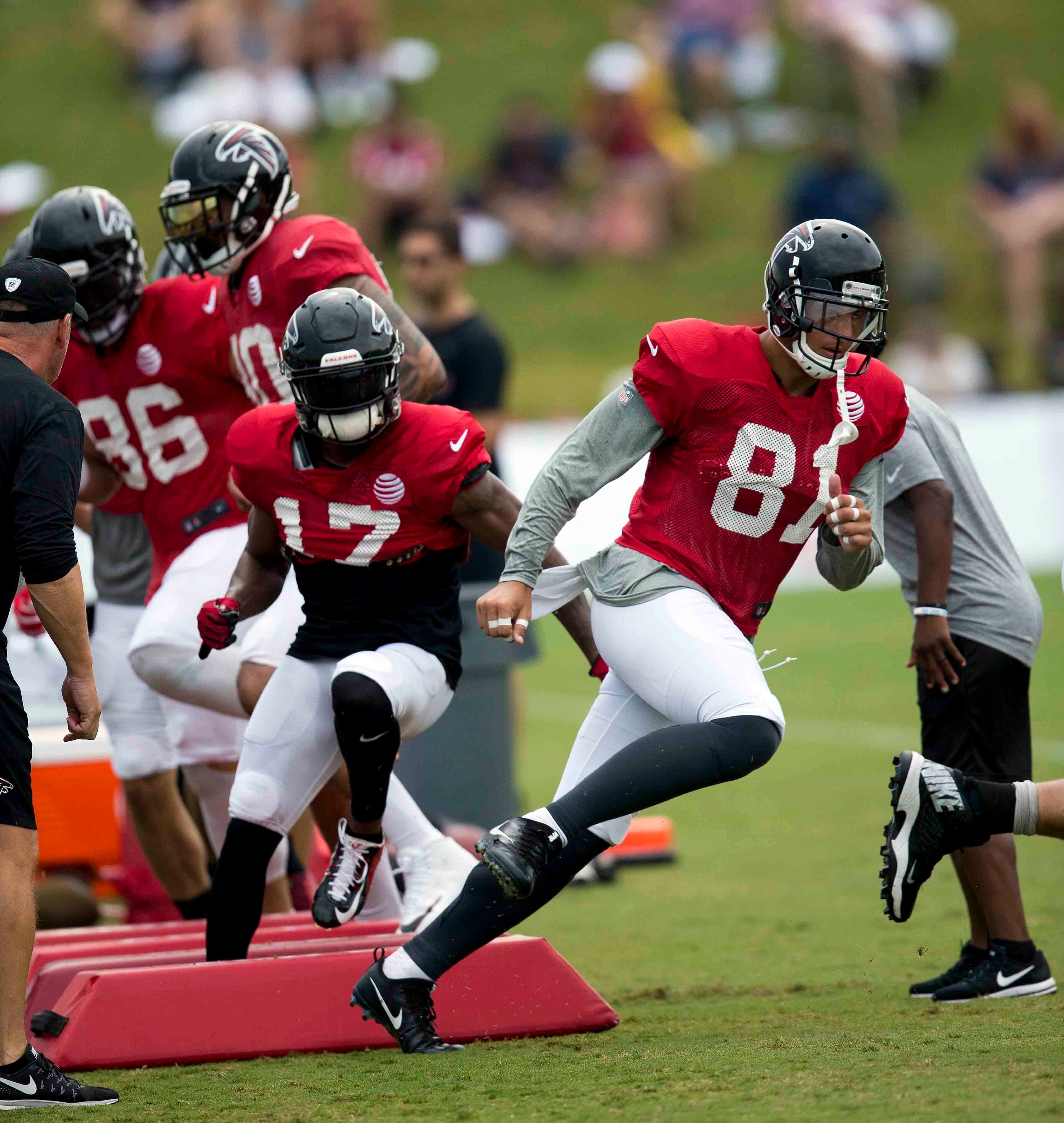 Falcons tight end Austin Hooper (81) runs a drill during Wednesday's training camp practice.